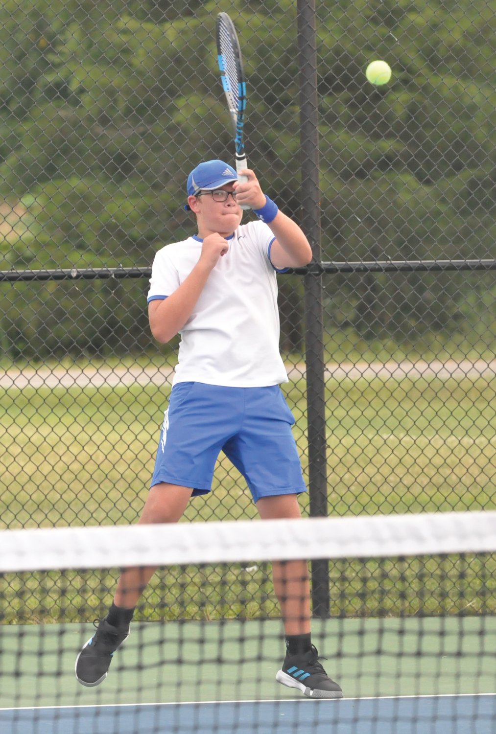 Crawfordsville sophomore James Murphy returns a shot at No. 1 singles against Fountain Central.