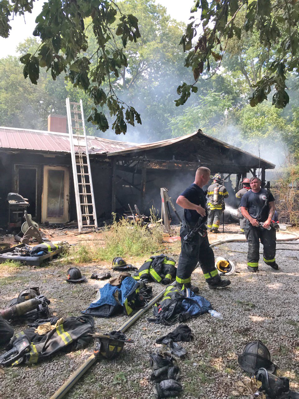 Photo Provided
Crawfordsville firefighters work Friday afternoon at the scene of a house fire at 912 Westwood Drive. The residence sustained “significant damage,” Crawfordsville Fire Chief Scott Busenbark said.