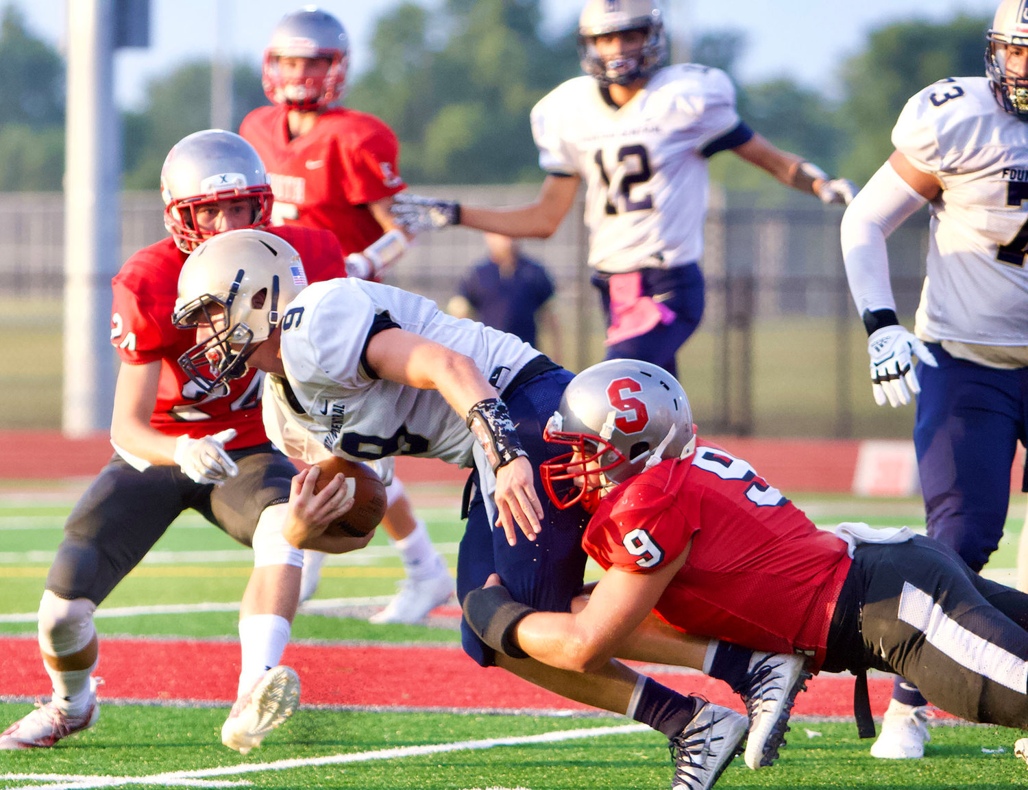 Fountain Central’s Owen Acton gets close to the goal line Friday as Southmont’s Wyatt Woodall hangs on to make a stop..