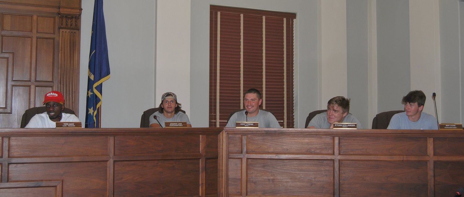 Students visit the city council chambers.