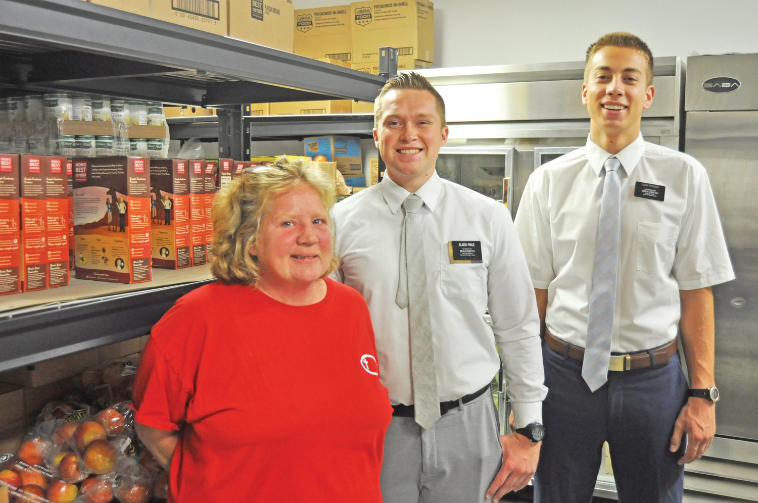 Ellen Simpson, FISH Food Pantry manager, Elder Price and Elder Prosser in the pantry on Tuesday. FISH is hosting a food drive at Kroger on Saturday.