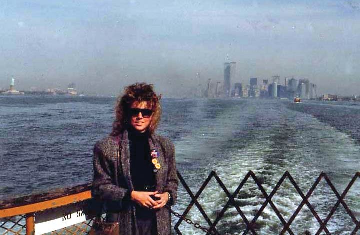 Kelly Childress rides the ferry into Manhattan with the World Trade Center towers rising above the skyline in this undated photo.