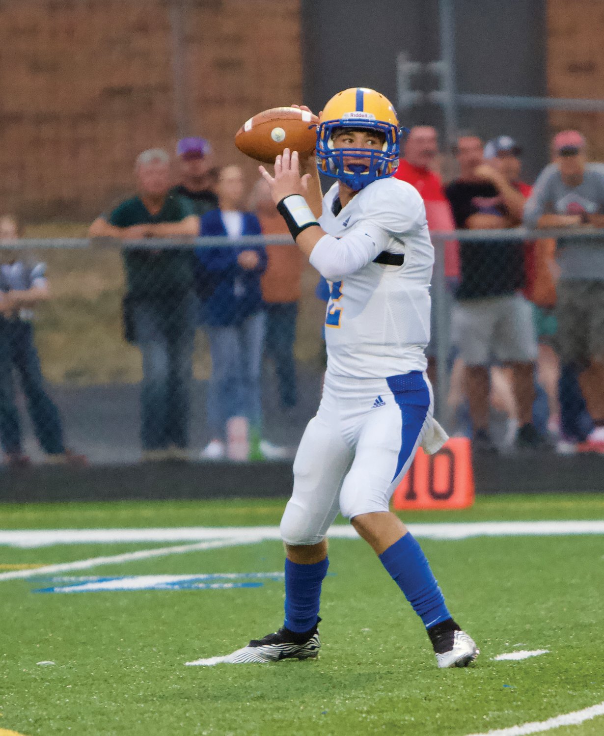 Crawfordsville's Kaiden Underwood fires a pass against Western Boone on Friday night.