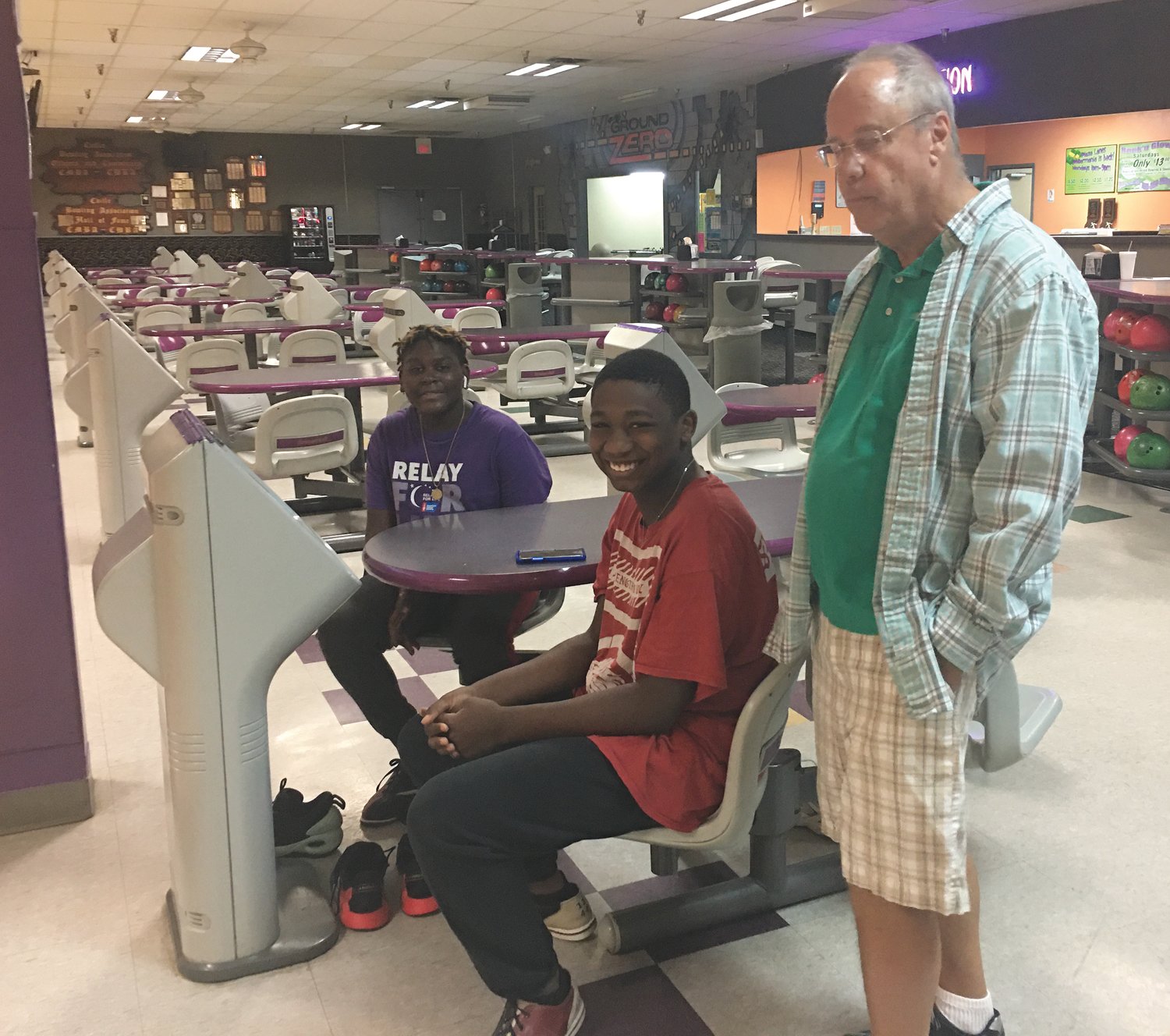 Terry Armstrong bowls with Gedavious and Anton at the Plaza Lanes.