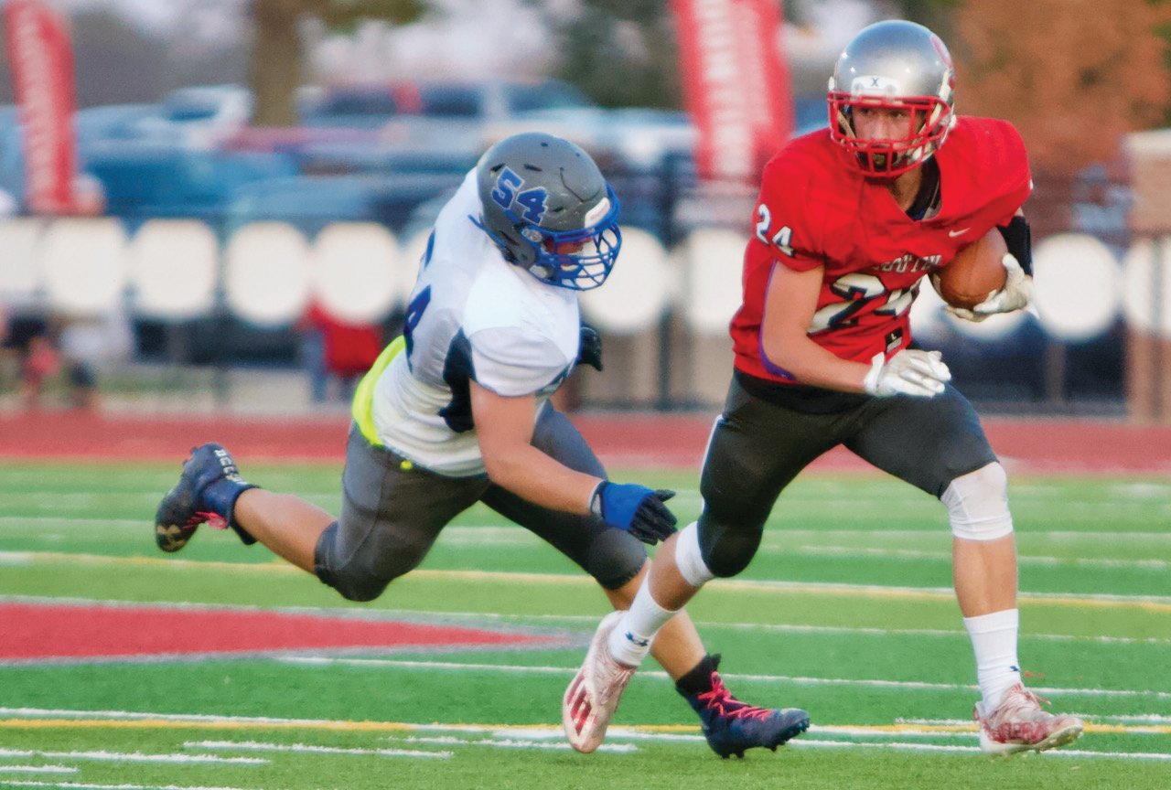 Southmont's EJ Brewer returns a punt on Friday night.