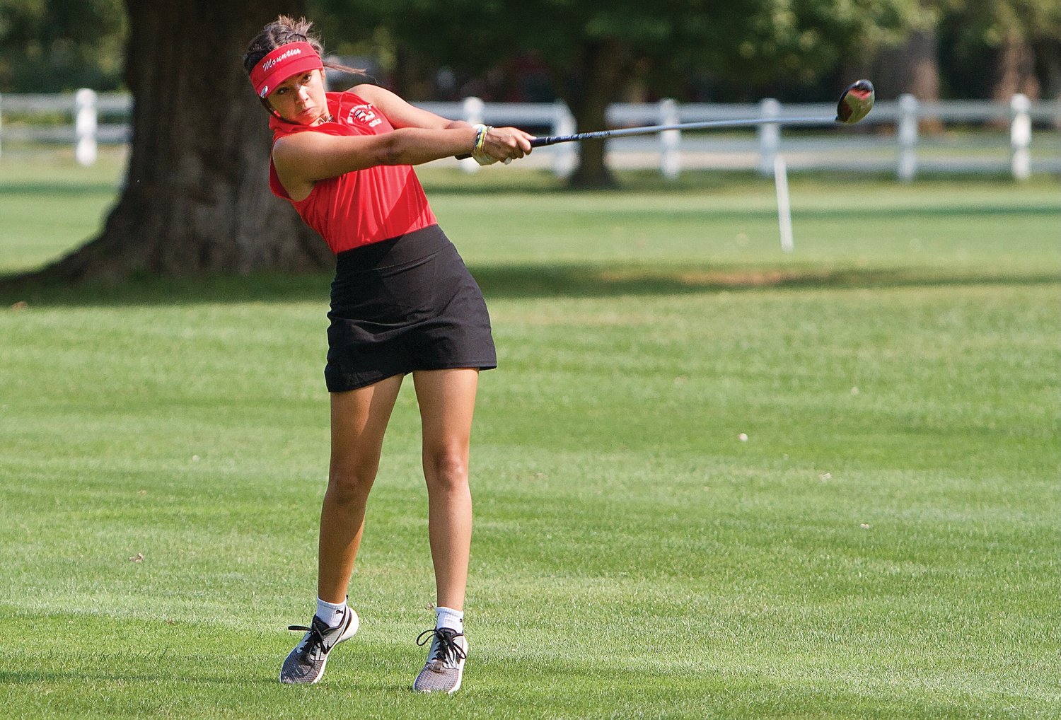 Southmont's Taylor Grino hits a wood shot from the fairway on Saturday at the SAC meet.