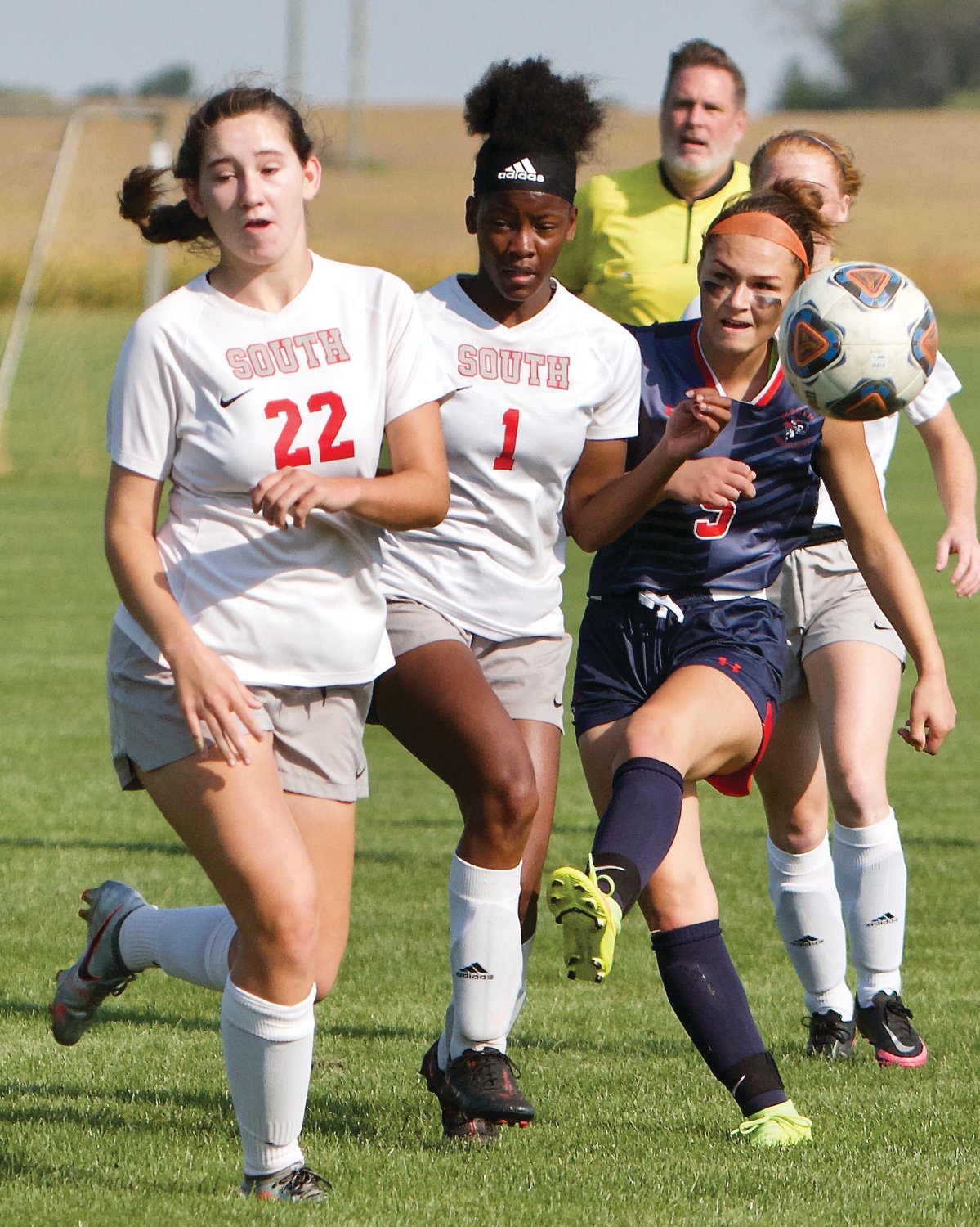 Southmont's Chloe Lynn, Shakhia Burks and North Montgomery's Teegan Bacon all fight for position.