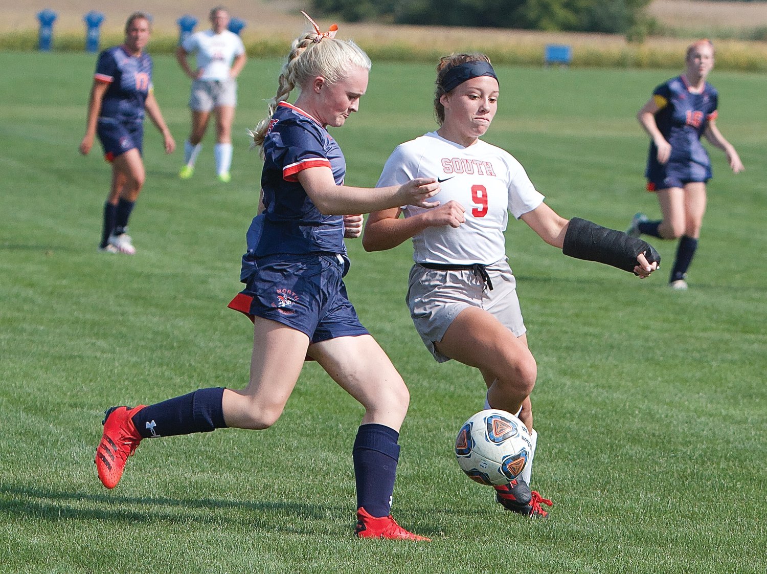 Southmont's Lillie Odum looks to work past a Charger.