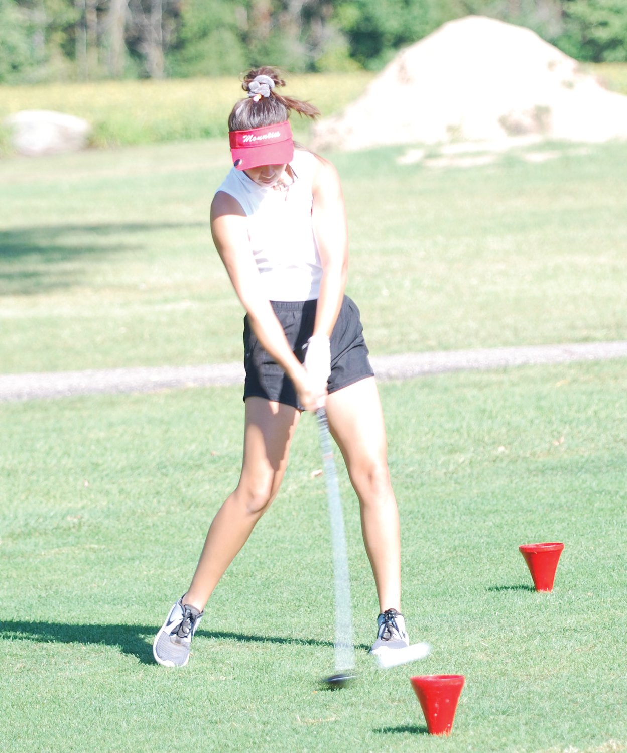 Southmont's Taylor Grino hits a tee shot on No. 1 Wednesday night at the county meet.
