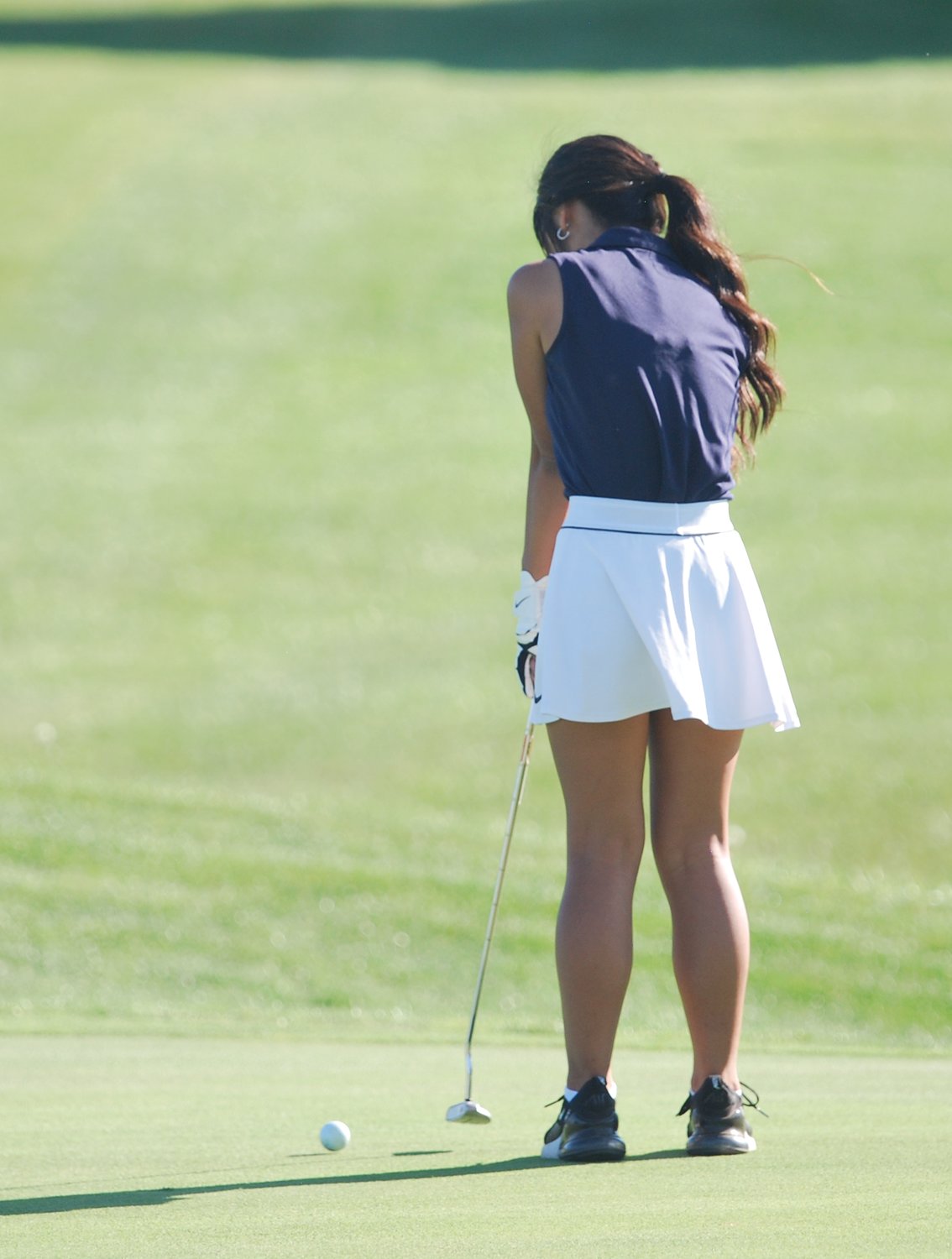 North Montgomery's Grace Littell putts on No. 4 at Rocky Ridge on Wednesday.