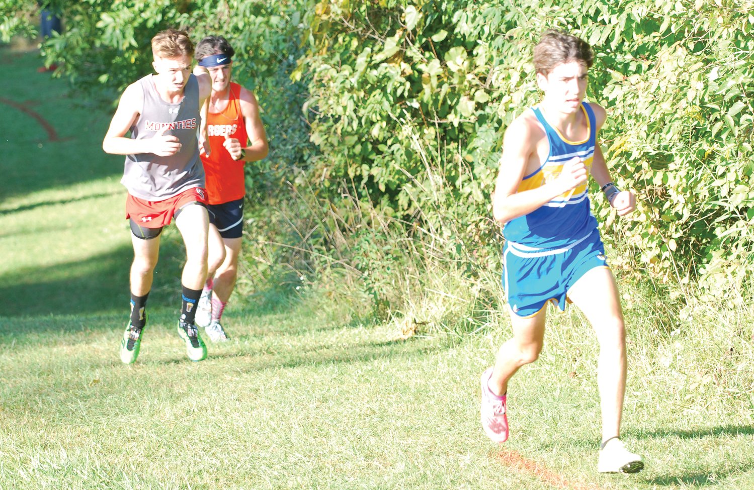 Crawfordsville's Ryann Miller, North Montgomery's Elijah McCartney, and Southmont's Mason Cass led the pack on Thursday night, before Cass pulled away for the county win.