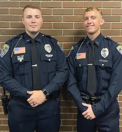 Officers Dakota Carlton, left, and Judson Grubbs were honored Monday at the Indiana Law Enforcement Academy.