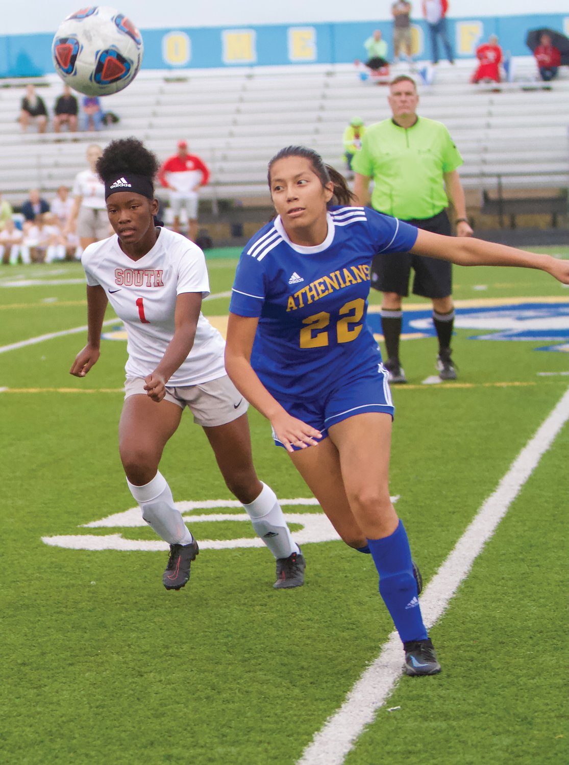 Crawfordsville's Eliana Salas Olvera and Southmont's Shakhia Burks chase down the ball.