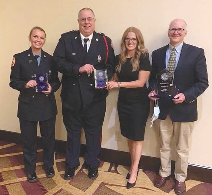Pictured, from left, are Firefighter and Paramedic Dayna Leonard, Firefighter and Paramedic Joe Crane, Early Intervention Specialist Rachel Kenner and Dr. Scott Douglas, who were honored Sunday at the IFCA’s Indiana Emergency Response Conference for their contributions to the Crawfordsville community.