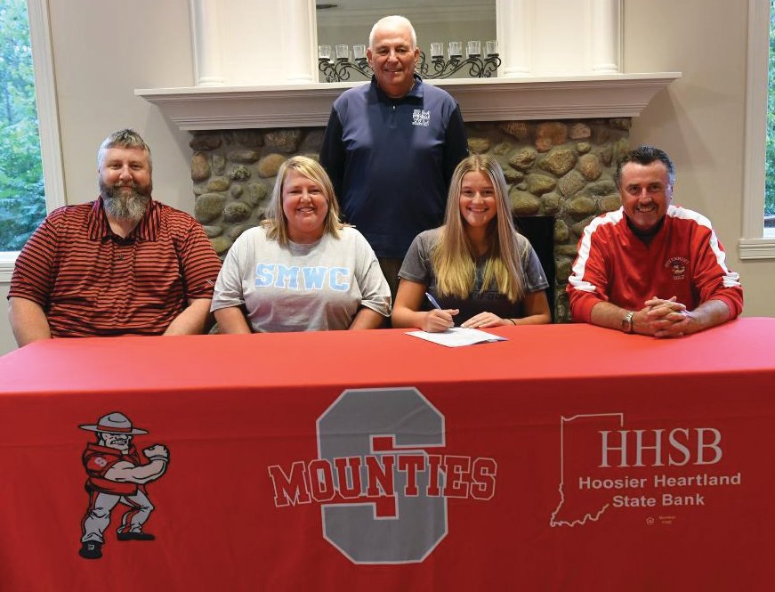 Macie Shirk is joined by her parents, Kyle and Heather Shirk, Southmont golf coach Bill Whalen and Saint Mary of the Woods coach Steve Higham.
