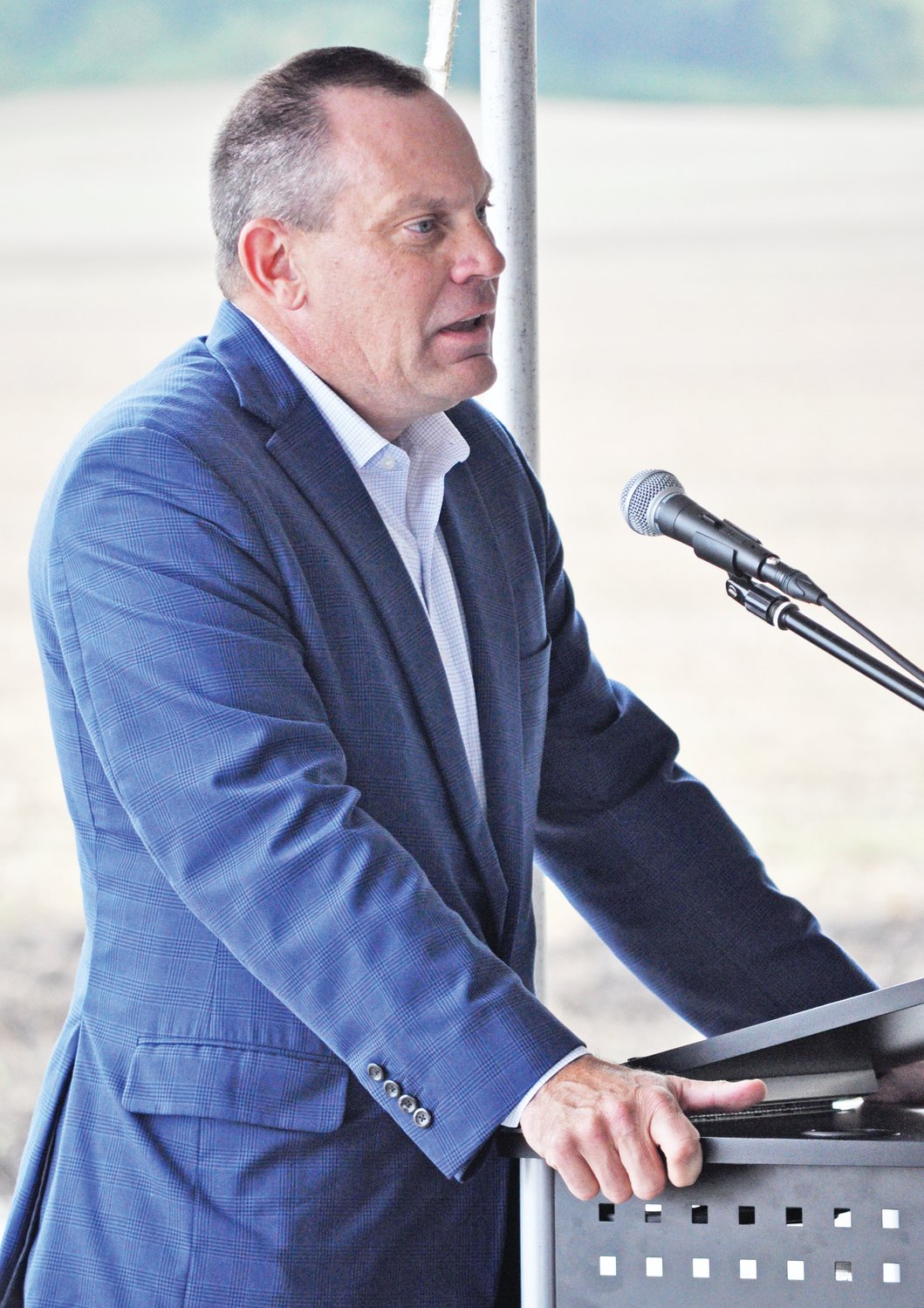 Cliff Buster, CEO North America of Tempur Sealy International, speaks at a groundbreaking ceremony for the Tempur Sealy plant on Thursday.
