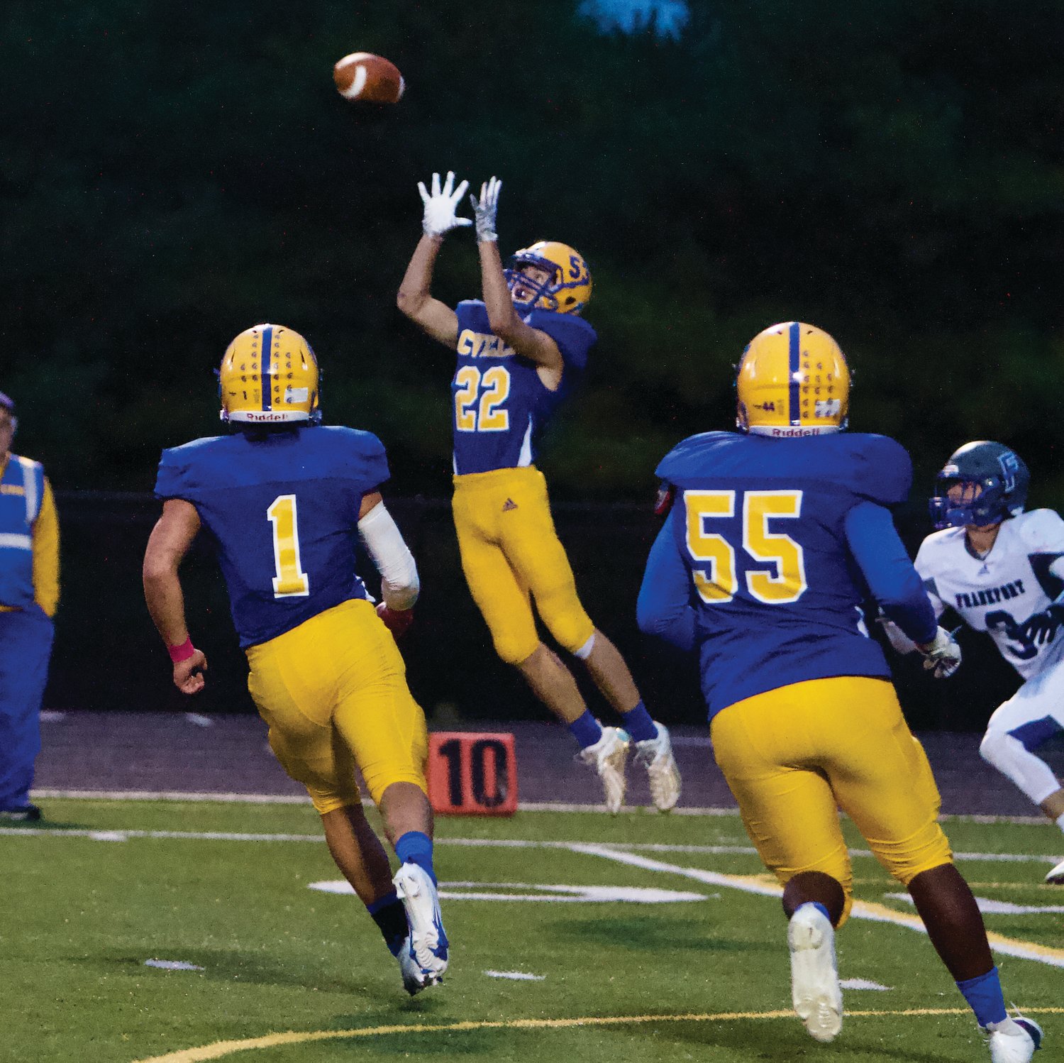 Austin Motz reaches for one of his two interceptions on the night.