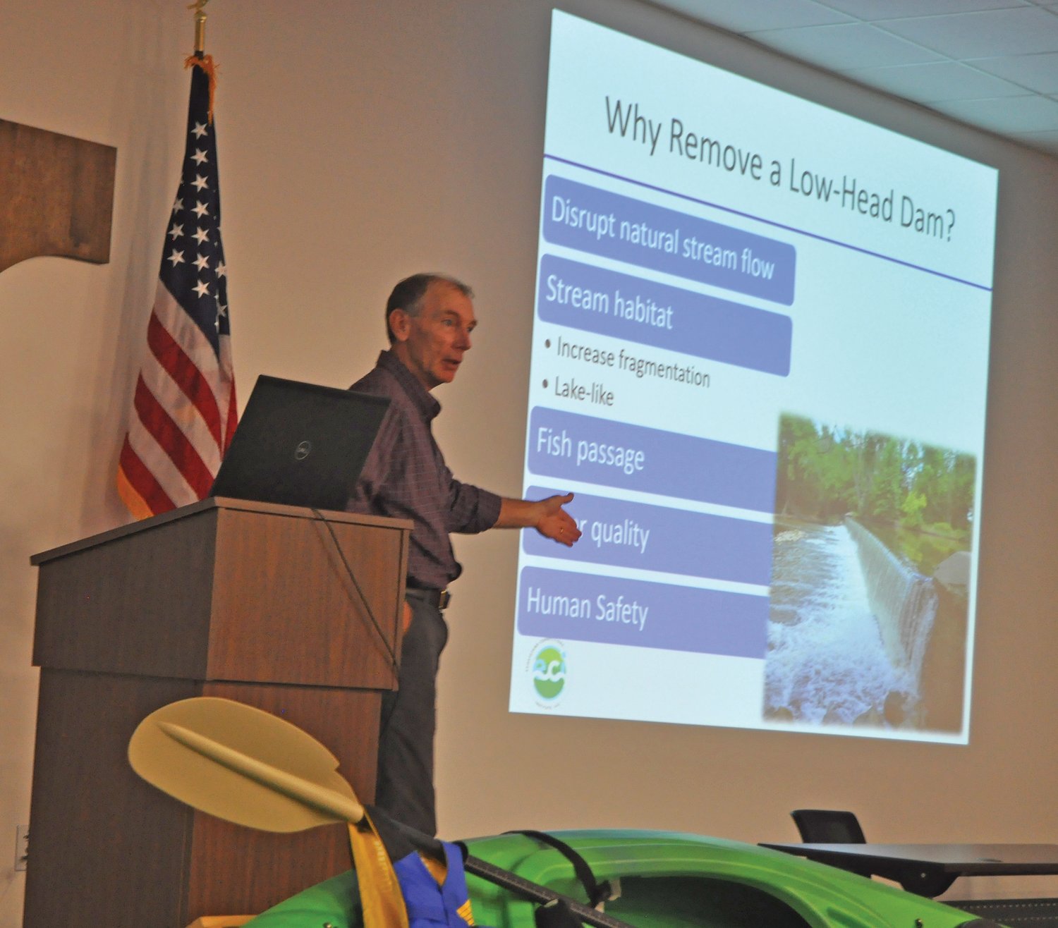 Dr. Jerry Sweeten, senior ecologist for Ecosystems Connections Institute, speaks about the Sugar Creek lowhead dam removal during the Friends of Sugar Creek annual meeting at the Hoosier Heartland State Bank Success Center on Thursday.