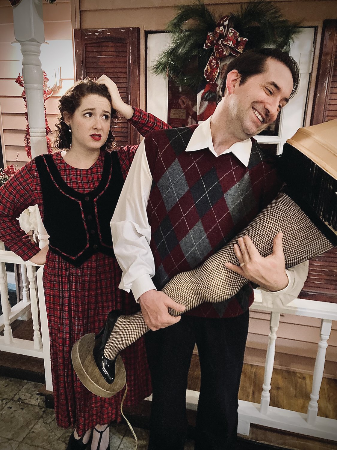 The Parkers (Samantha Bagdon and Thomas J. Besler) discuss the infamous Leg Lamp, in one of the iconic scenes of A Christmas Story: The Musical. This fan-favorite runs from Nov. 19 through Dec. 19 at Myers Dinner Theatre in Hillsboro.