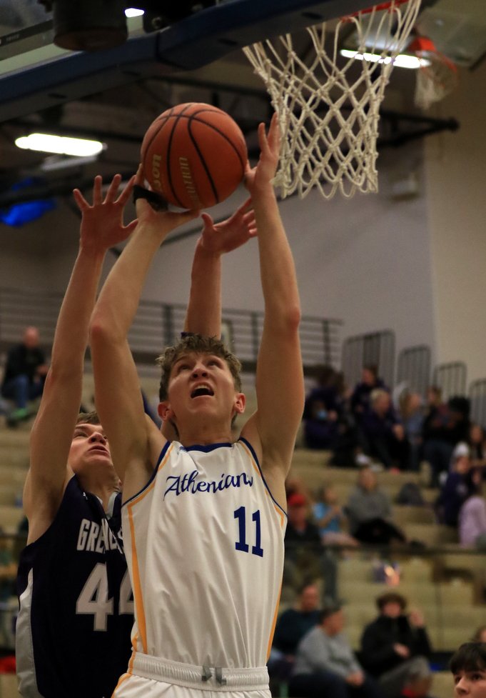 Ian Hensley led the Athenians with 16 points in their season opening 52-32 win over Greencastle.