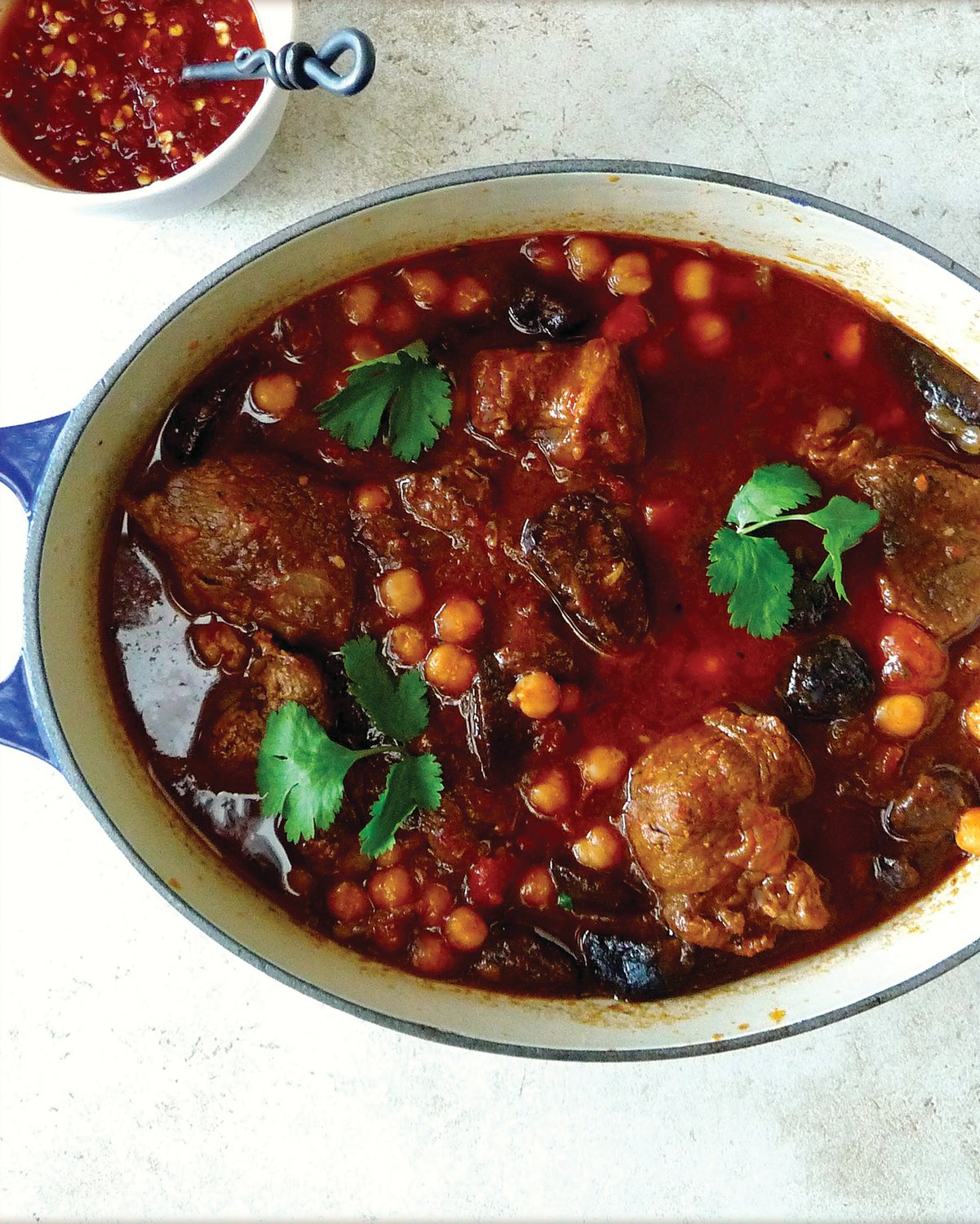 This stew is fragrant and meaty, softly sweetened with figs, heady with harissa, and redolent with ras el hanout, which is a North African spice blend consisting of an entire shelf of spices, including cinnamon, cardamom, turmeric, ginger and clove.