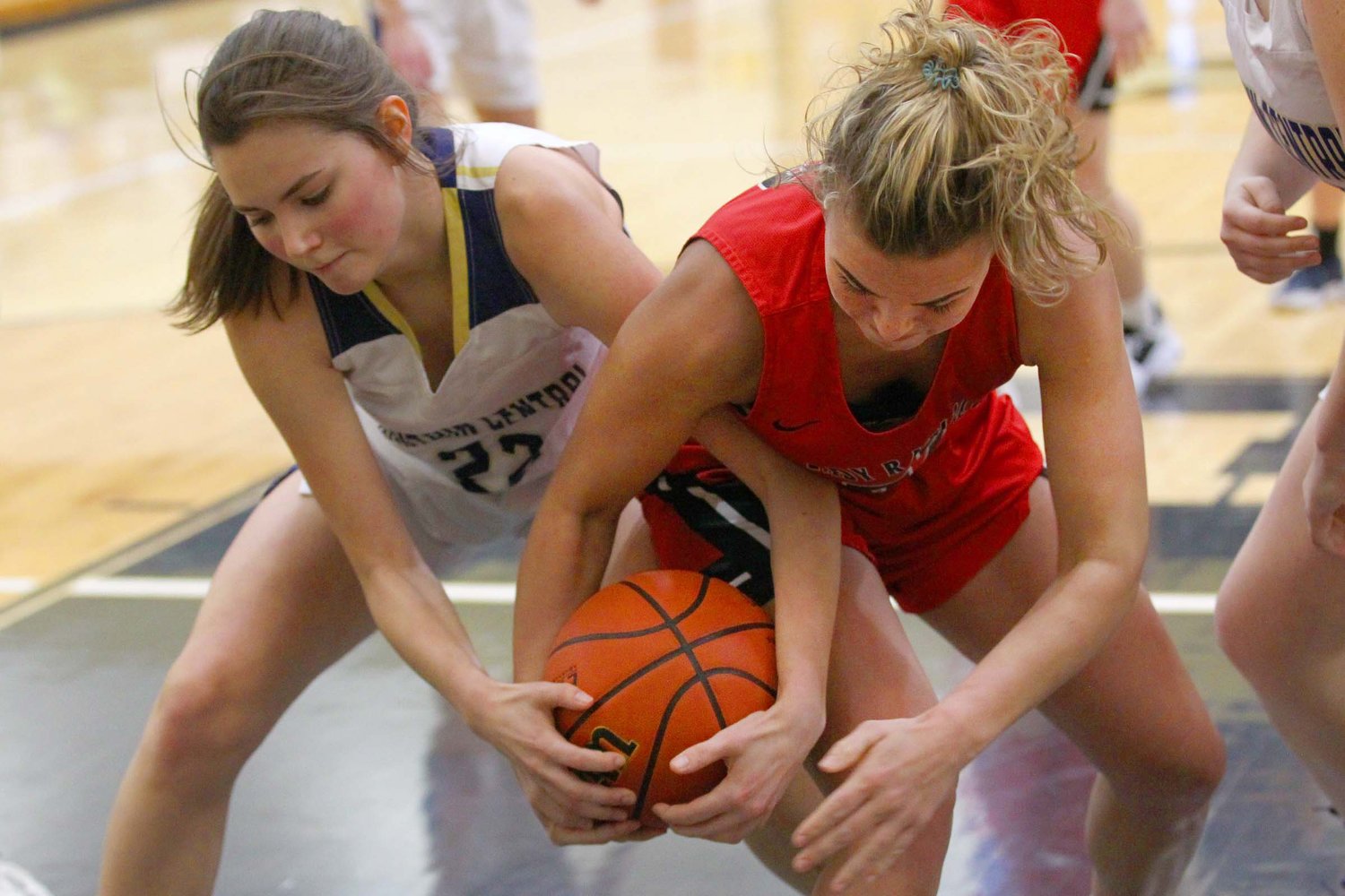 KayLee Spragg of Fountain Central and CeCe Rice of Attica battle for a rebound.
