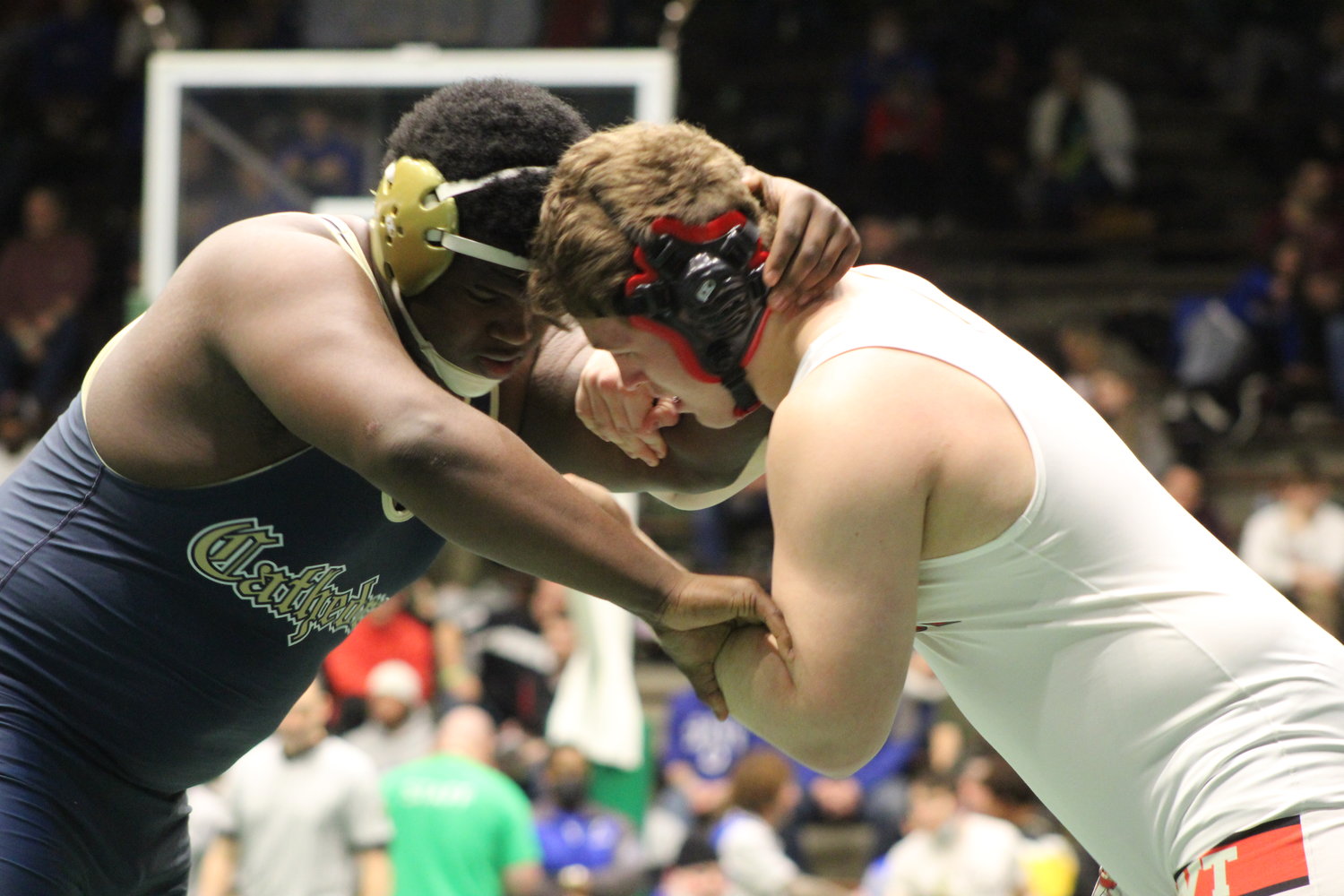 Southmont's Zayden Dunn wrestles in the opening round against Cathedral's Hosia Smith.
