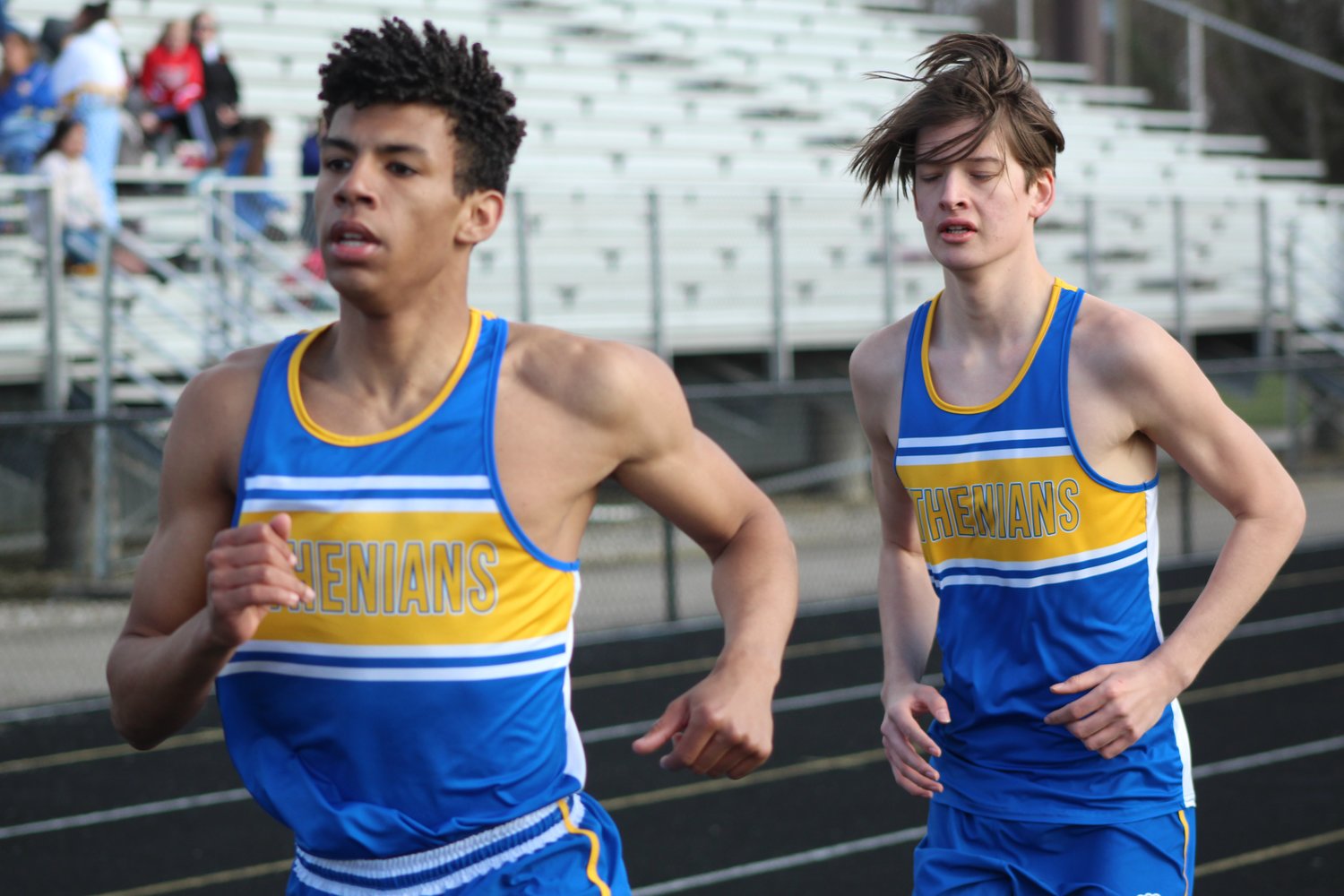 Tyson Fuller and Roman Contreas race in a relay for the CHS boys.
