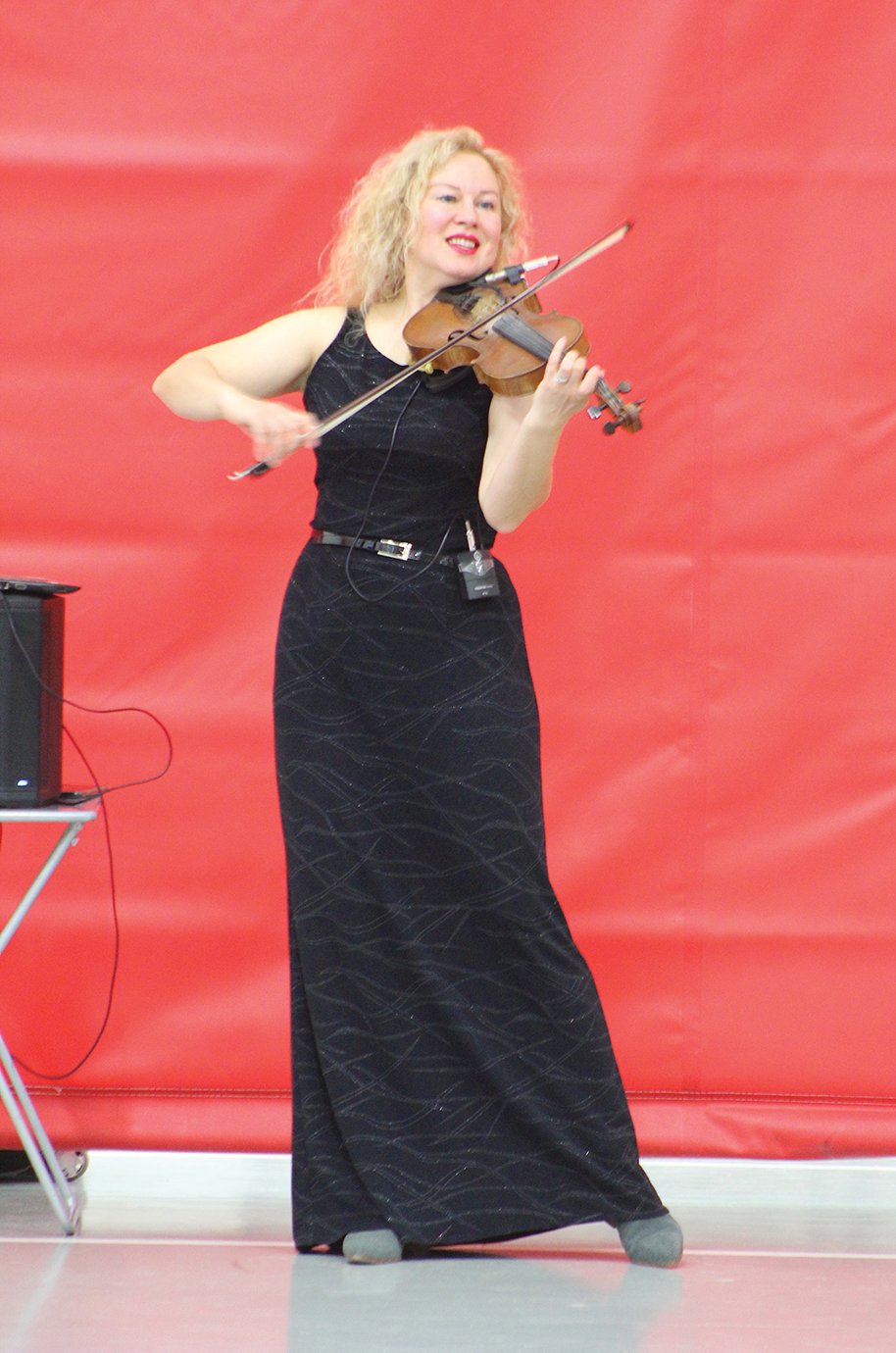 As in previous years, violinist Olga Berezhnaya serenades guests Wednesday at Southmont
