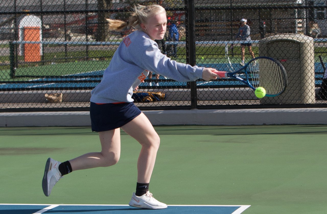 Paige Hudson extends for a return at No. 3 singles for North Montgomery.