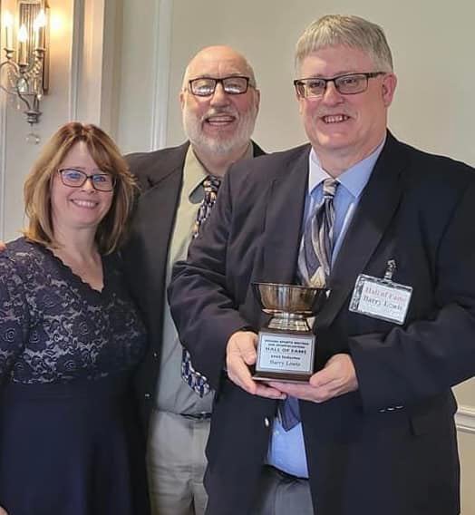 Montgomery County’s own Barry Lewis (right) is pictured with his wife Sherry (left) and Paul Condry (center) at the Indiana Sportswriters and Sportscasters Hall of Fame induction ceremony.