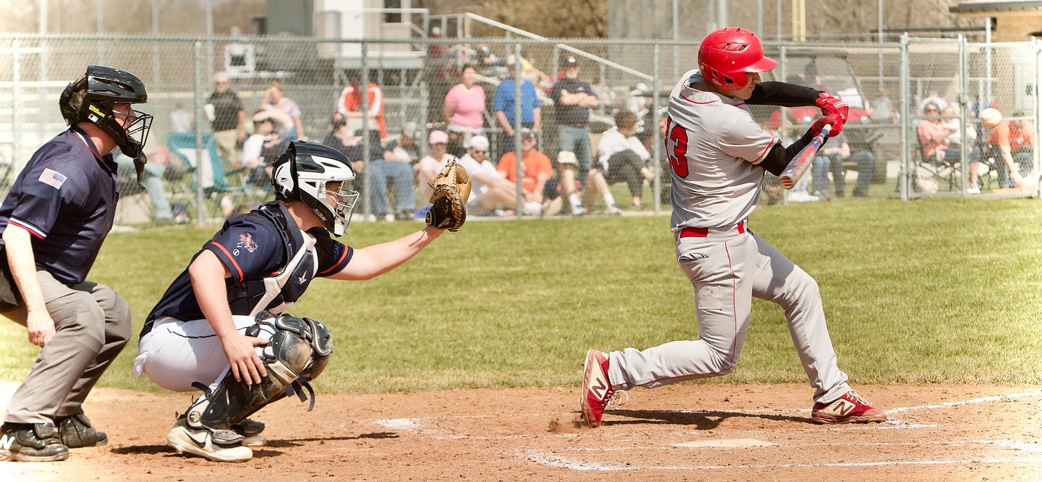 Adam Cox takes a swing for the Mounties.