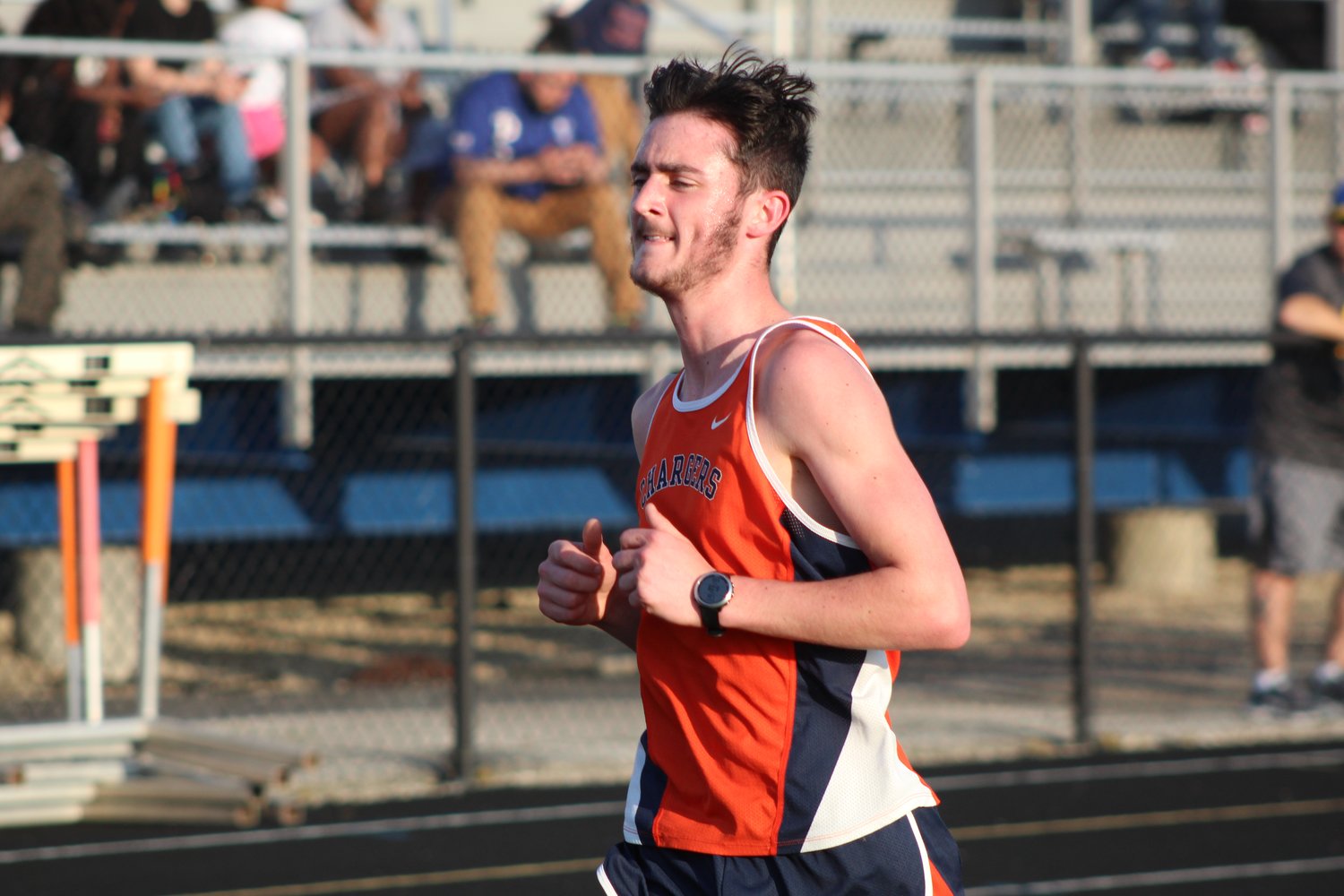 Elijah McCartney earned a pair of third place finishes for the Chargers in the 1600 and 3200 meter runs.