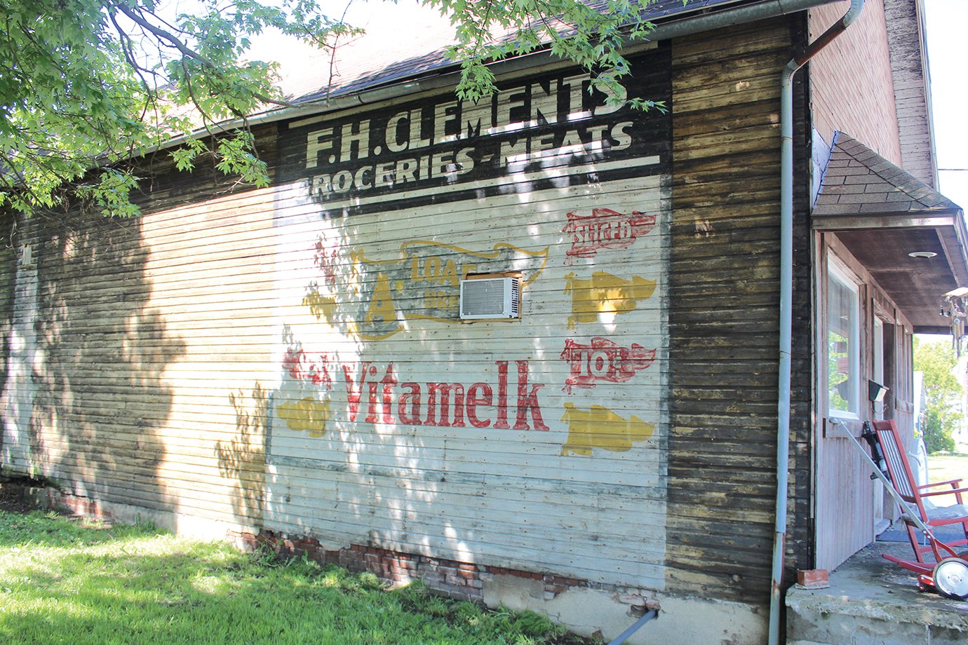 A Crawfordsville man looking to renovate the old F.H. Groceries general store discovered an original sign dating back to the building’s original construction, advertising “Vitamelk” and sliced bread. The new owner, Jeff Osborn, plans to open his own woodworking business in the dilapidated building this fall following a complete overhaul.