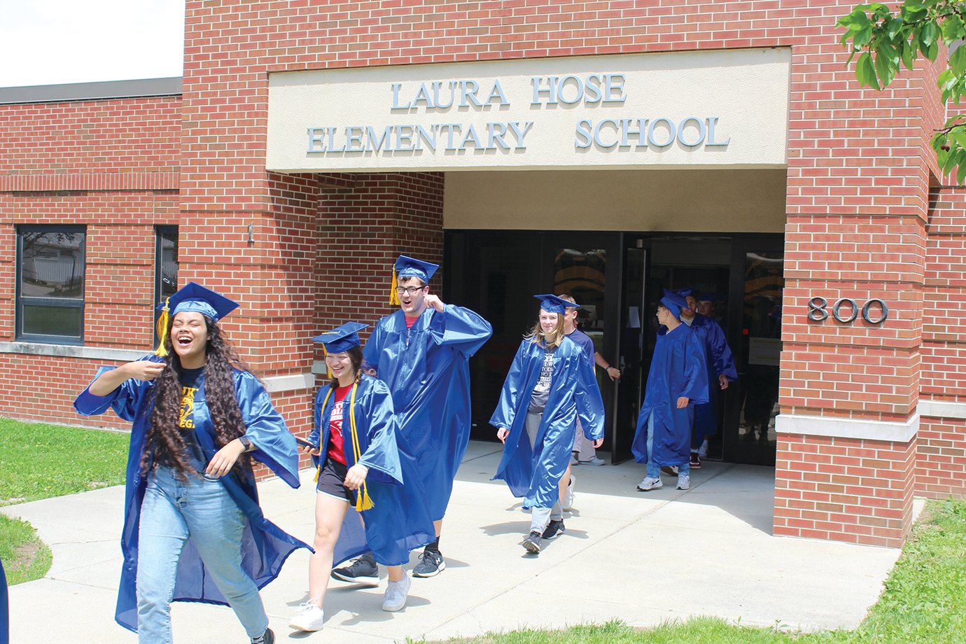Crawfordsville seniors elated from their Senior Walk at Hose Elementary return to buses bound for Nicholson.