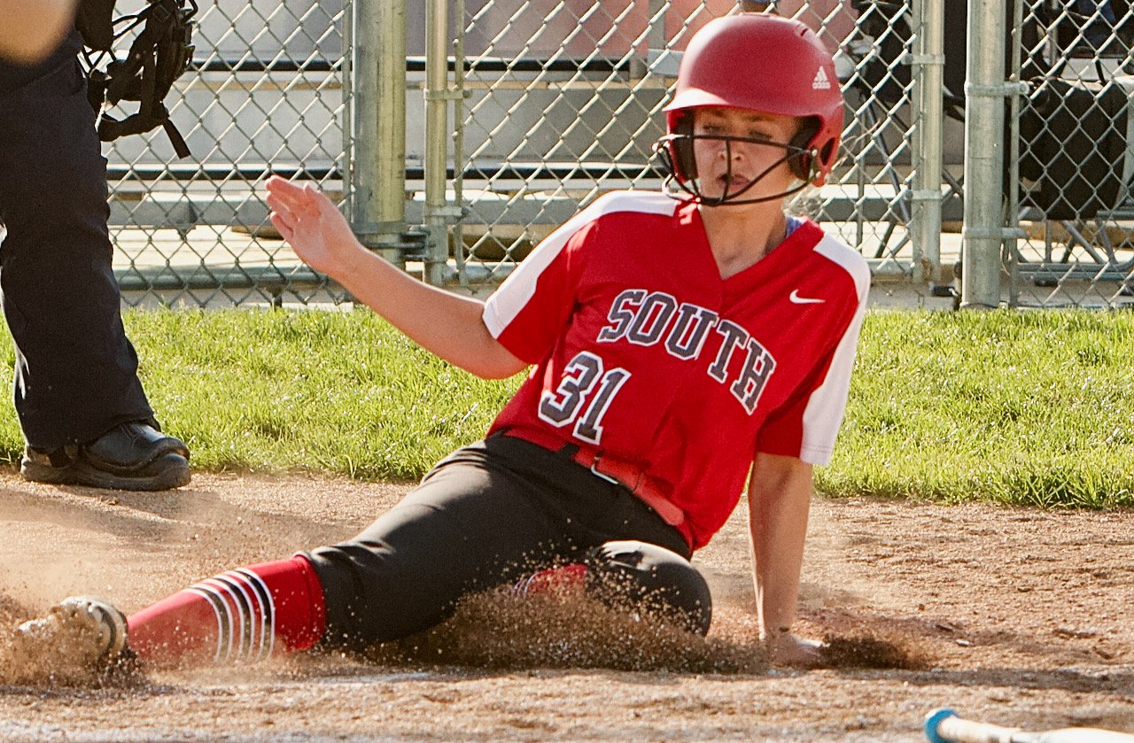 Cheyenne Shaw slides into home as she scored one of the three Southmont runs.