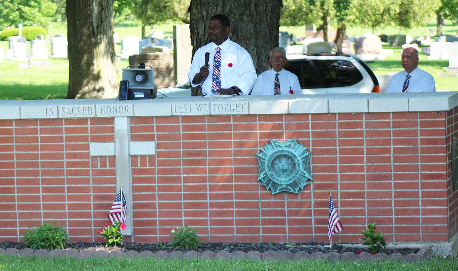 Retired Brigadier General Wayne Black delivers the message of remembrance during the Memorial Day service Monday.