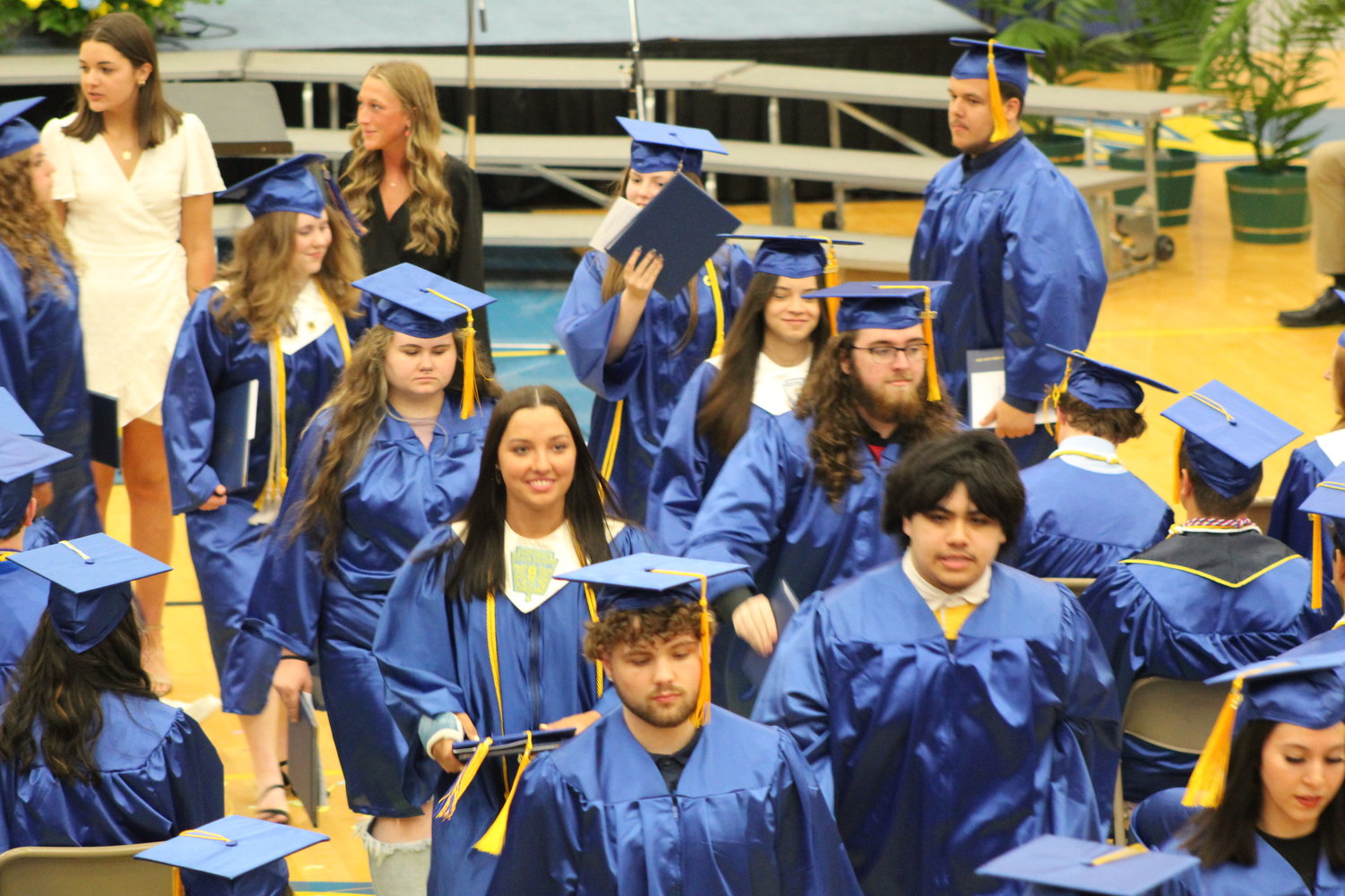 Members of the Class of 2022 exit the gym after officially being named graduates of Crawfordsville High School.