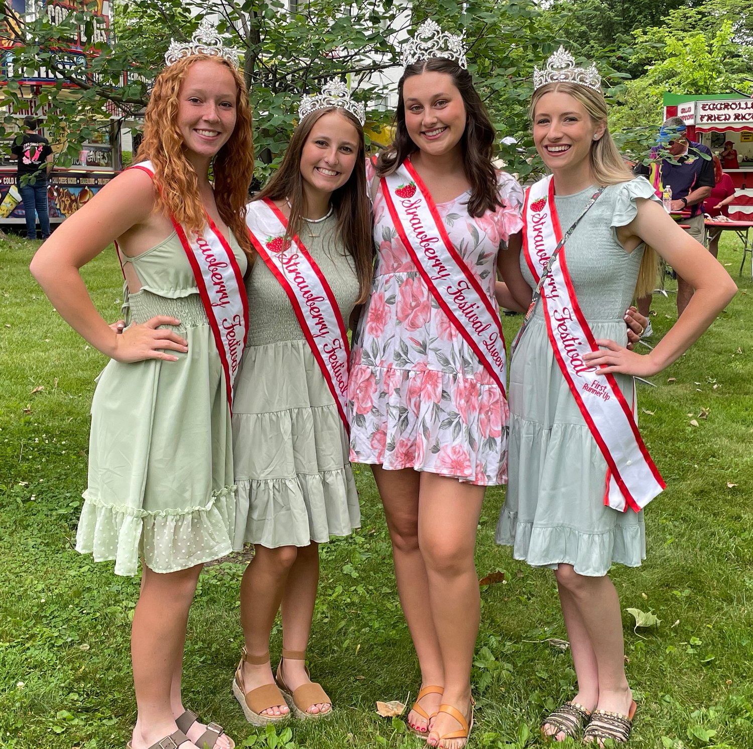 Strawberry Festival Queen Rylie Koopman, second from right, poses with her court, Addison Meadows, Peri McClaskey and Bracy Slavens.