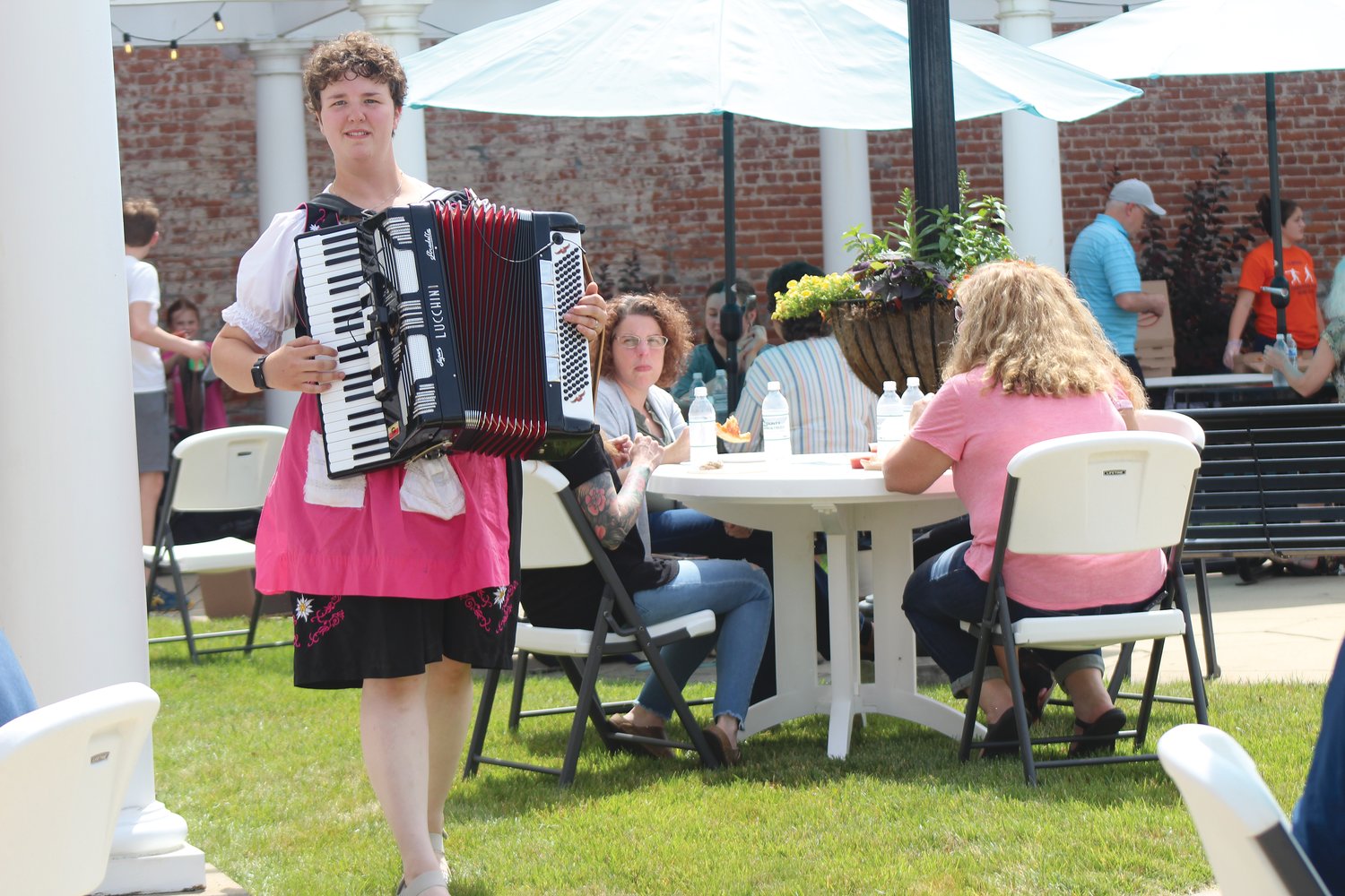 Josie Murray performs Friday on the accordion during the first Lunch on the Plaza event in downtown Crawfordsville. The annual lunch series takes place during the summer months and is sponsored by the Crawfordsville Main Street organization. The next event is slated for 11:30 a.m. to 1 p.m. July 15 and will feature food from Aki Les Voy Takeria and entertainment by Lee Douma & Co. The final lunch is Aug. 19 with food from Francis & Mount and entertainment by Sharon McKnight & Friends.