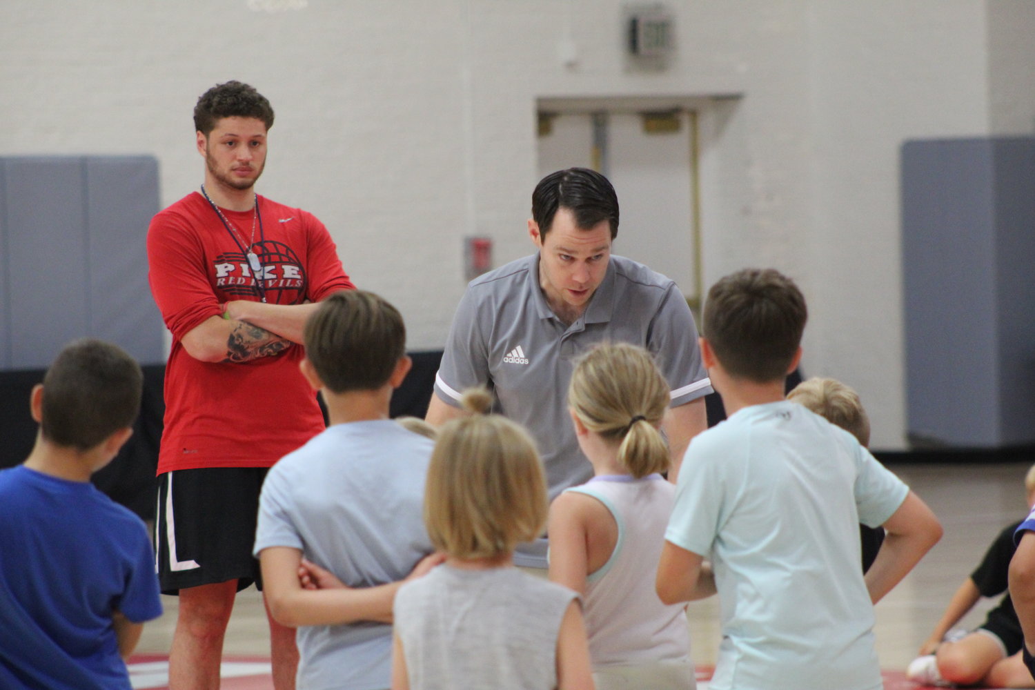 Wabash Basketball Assistant Coach Pat Sullivan instructs some of the campers during the skills camp hosted by the Little Giants. The camp has over 80 kids in attendance.