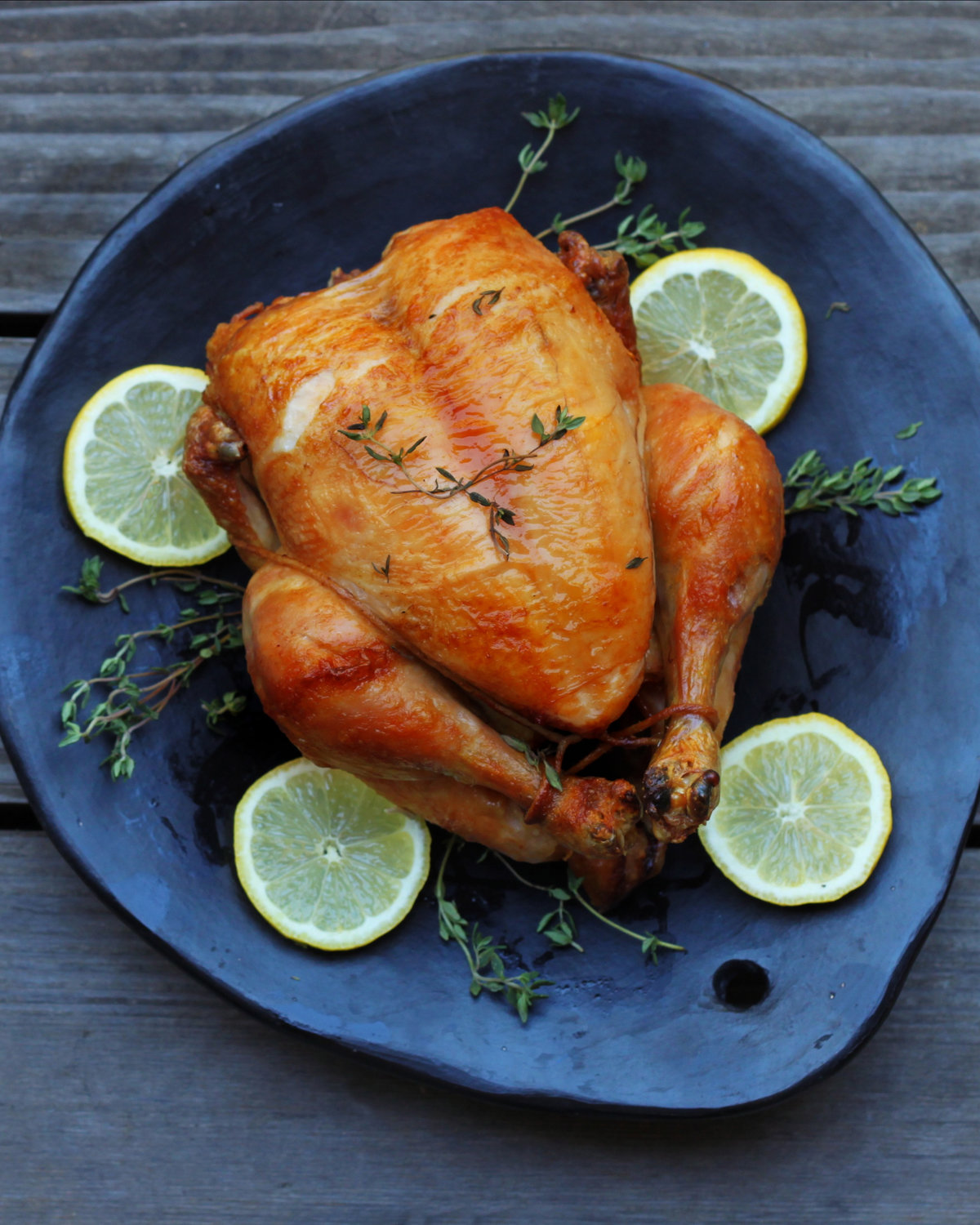 There is nothing more comforting than the aroma of a chicken roasting. Cooking a whole bird is quite simple, and can be done in an oven or on a grill.