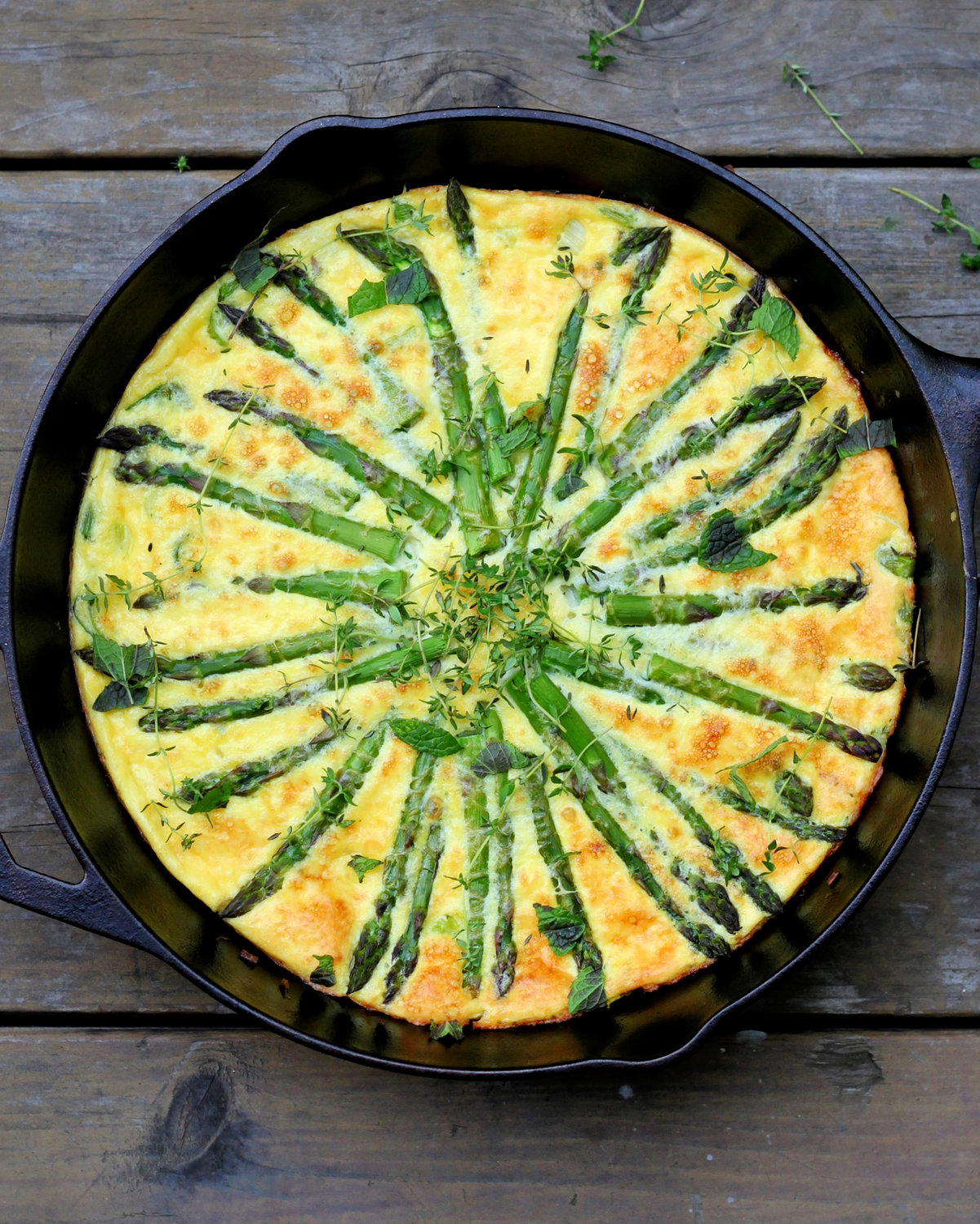 A frittata is a light and fluffy baked egg dish, a hybrid of an omelet and a quiche.