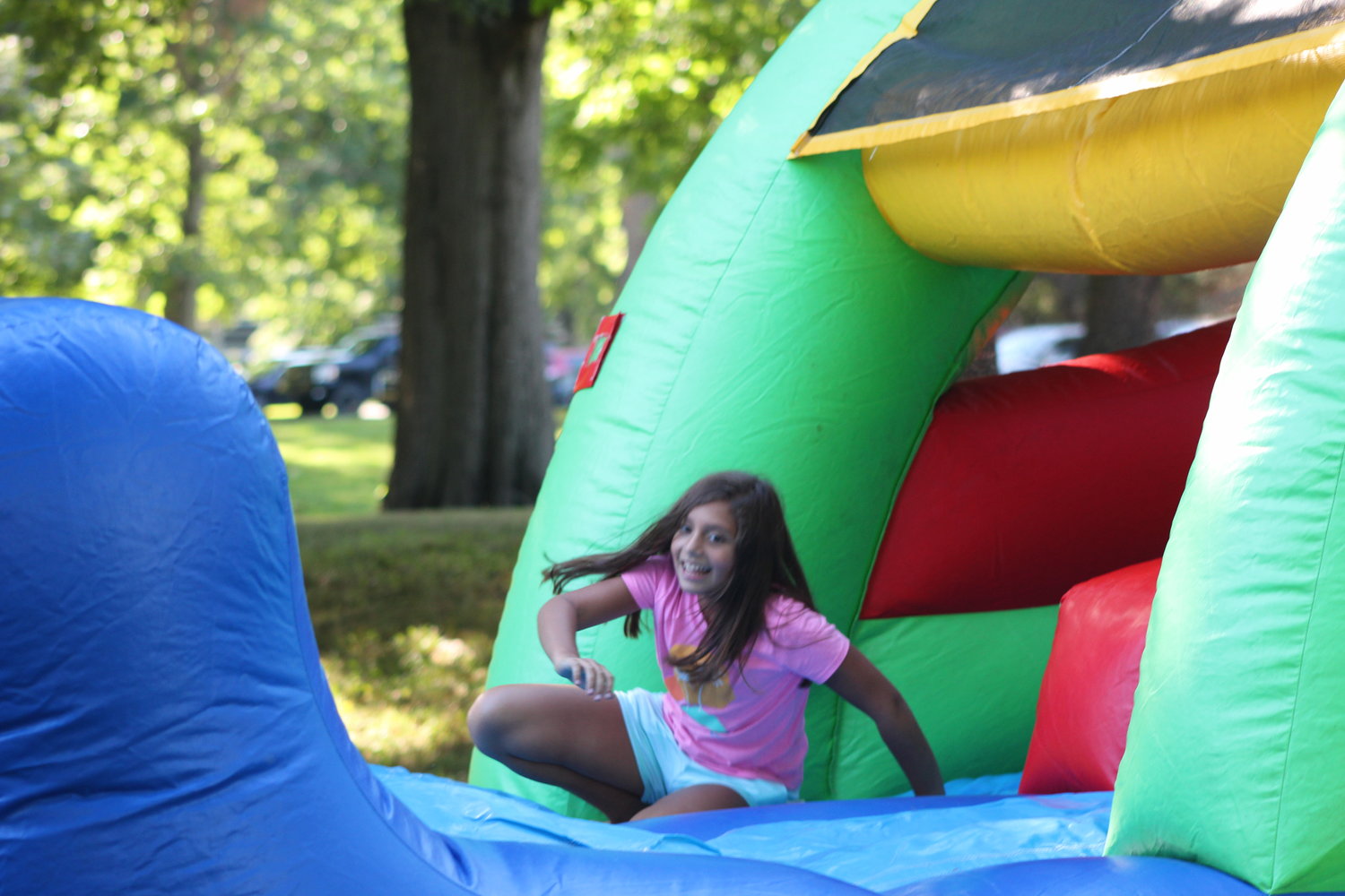 An inflatable obstacle course was a popular attraction.