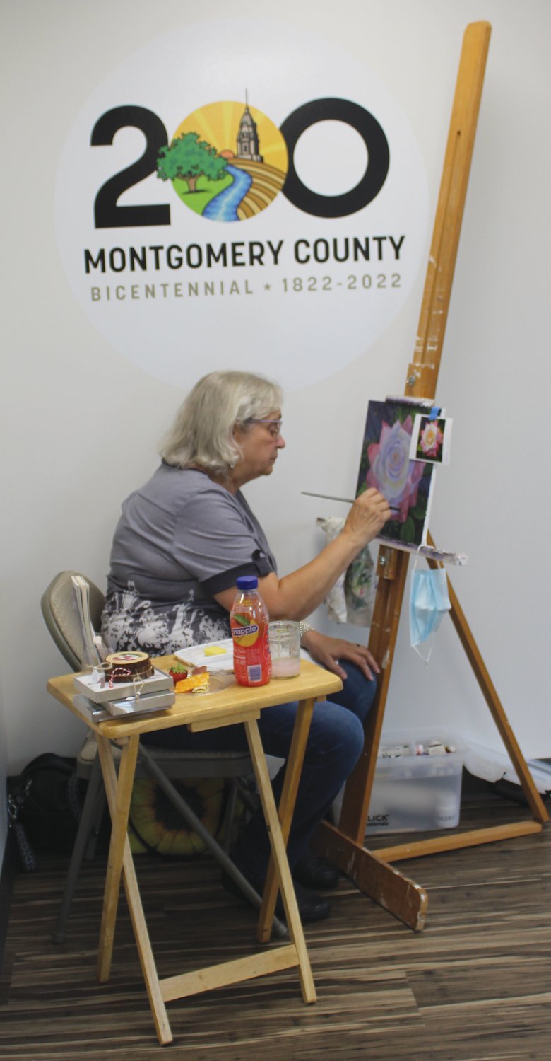 Kathy Houghton was among the local artists demonstrating their craft Tuesday at the open house for the Montgomery County Government Center.