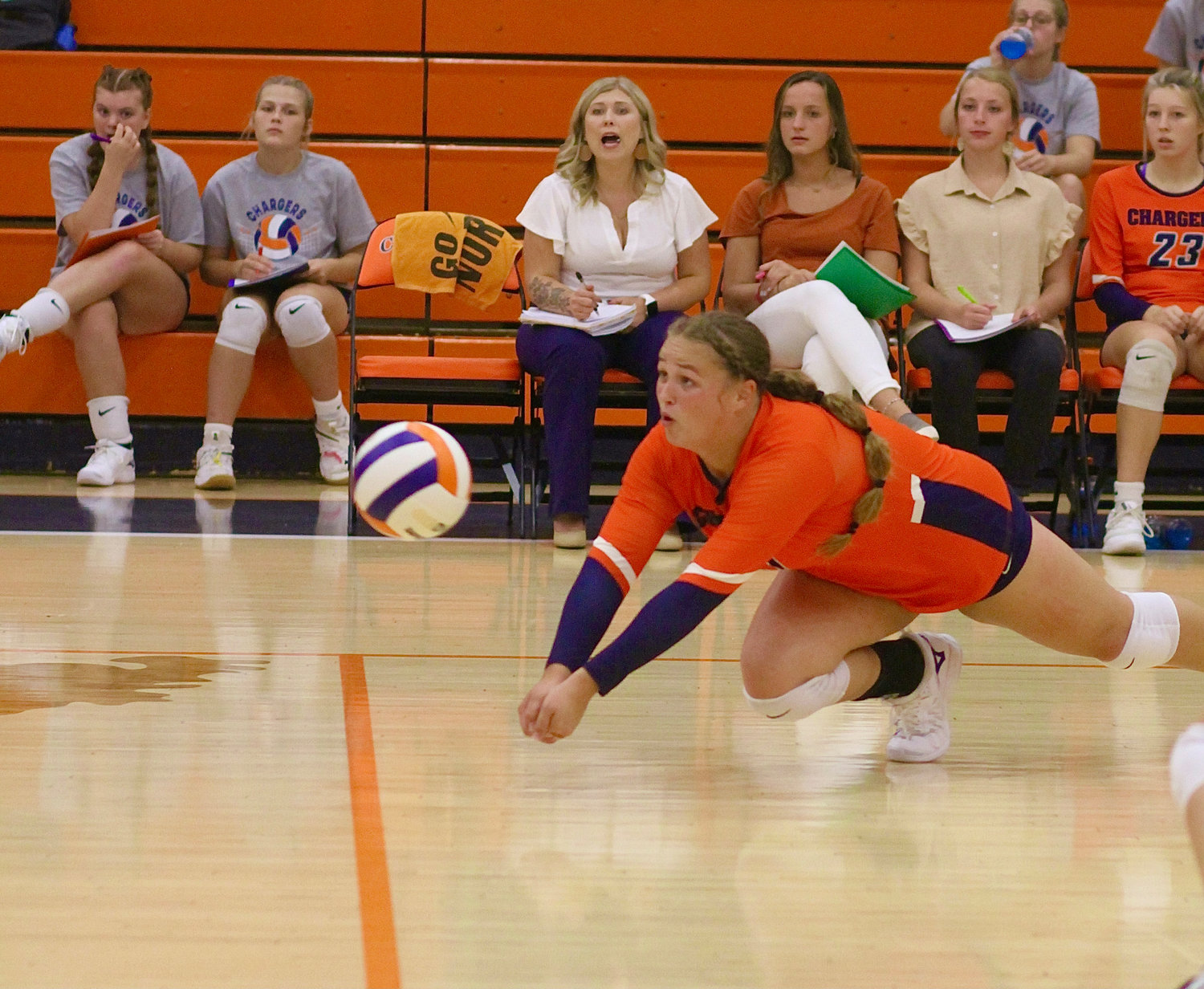 Sophomore Piper Ramey lays out for a ball during the Chargers match against Frankfort on Tuesday.