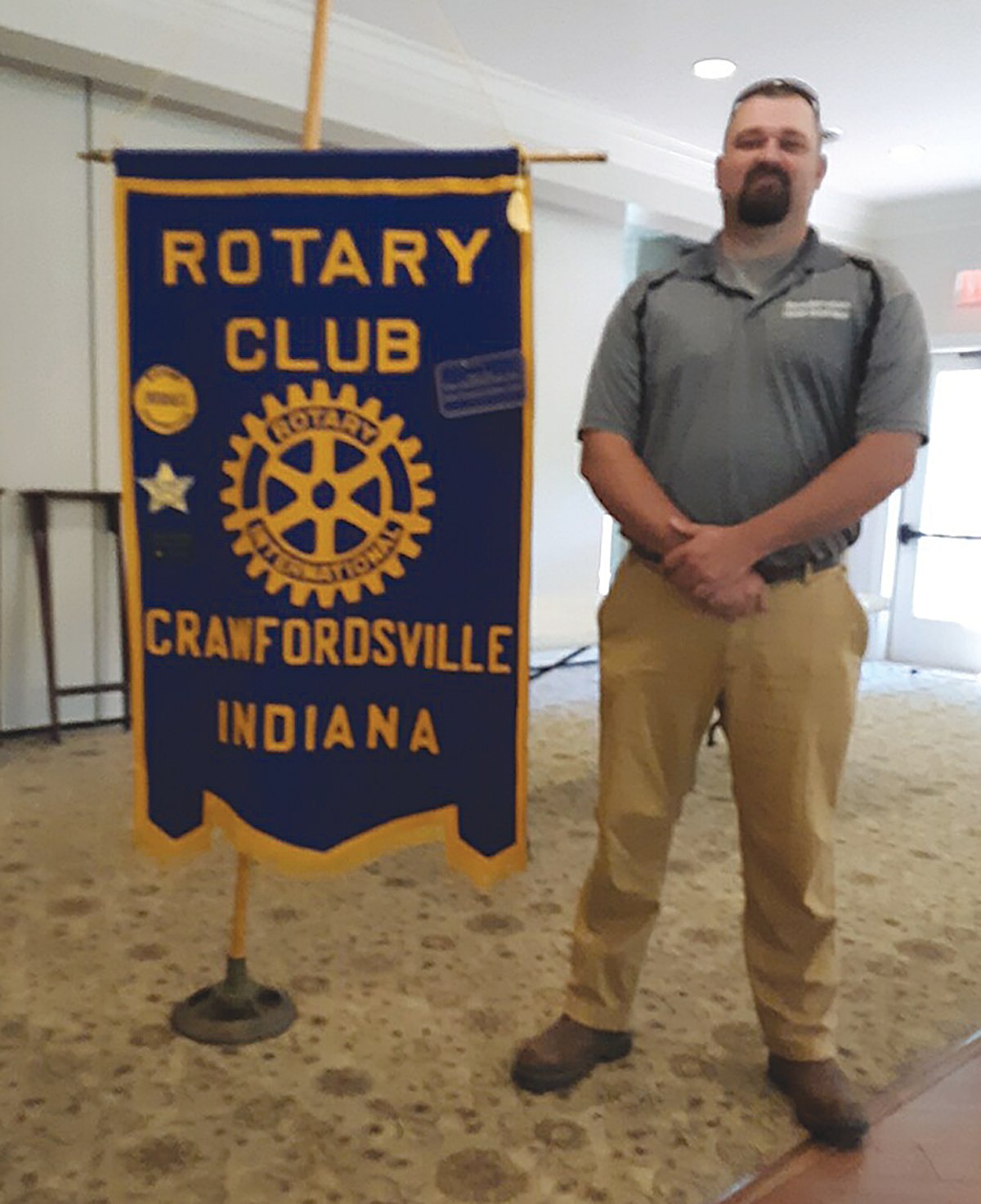 Jake Lough, director of the Montgomery County Highway Department, spoke to members of the Crawfordsville Rotary Club on Aug. 17. He is a county native and graduated from North Montgomery High School in 2005 and Vincennes University in 2007. He has worked for the highway department for 14 years. He shared a lot of information concerning the county roads. There are 800 miles of roads in the county for which the highway department is responsible. There are 500 miles of paved and 300 miles of gravel roads. Larger farm machinery, heavier weights and increased traffic causes more wear and tear on the roads. Some roads were built 60 or 70 years ago. Chip seal is the main preservation of the roads. In 2000, there were 50 employees in the department. Today there are 33 with some openings. The department is funded only through the gasoline tax. to meet “best practices” for road maintenance the department would need $2.4 million additional to the current budget.