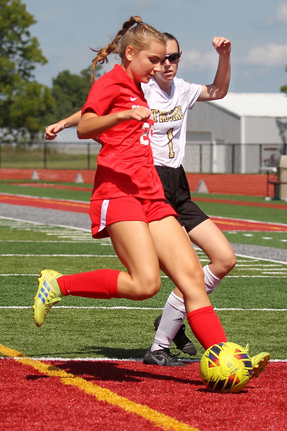 Abigail Korhorn of Southmont cuts off a drive by Isabella Lynch of Covington.