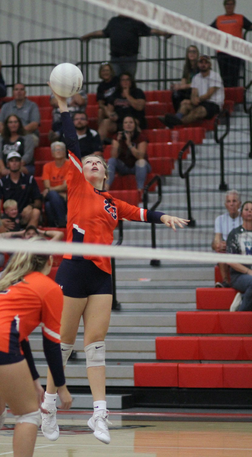 North Montgomery's Kaydence Young goes up for a kill.