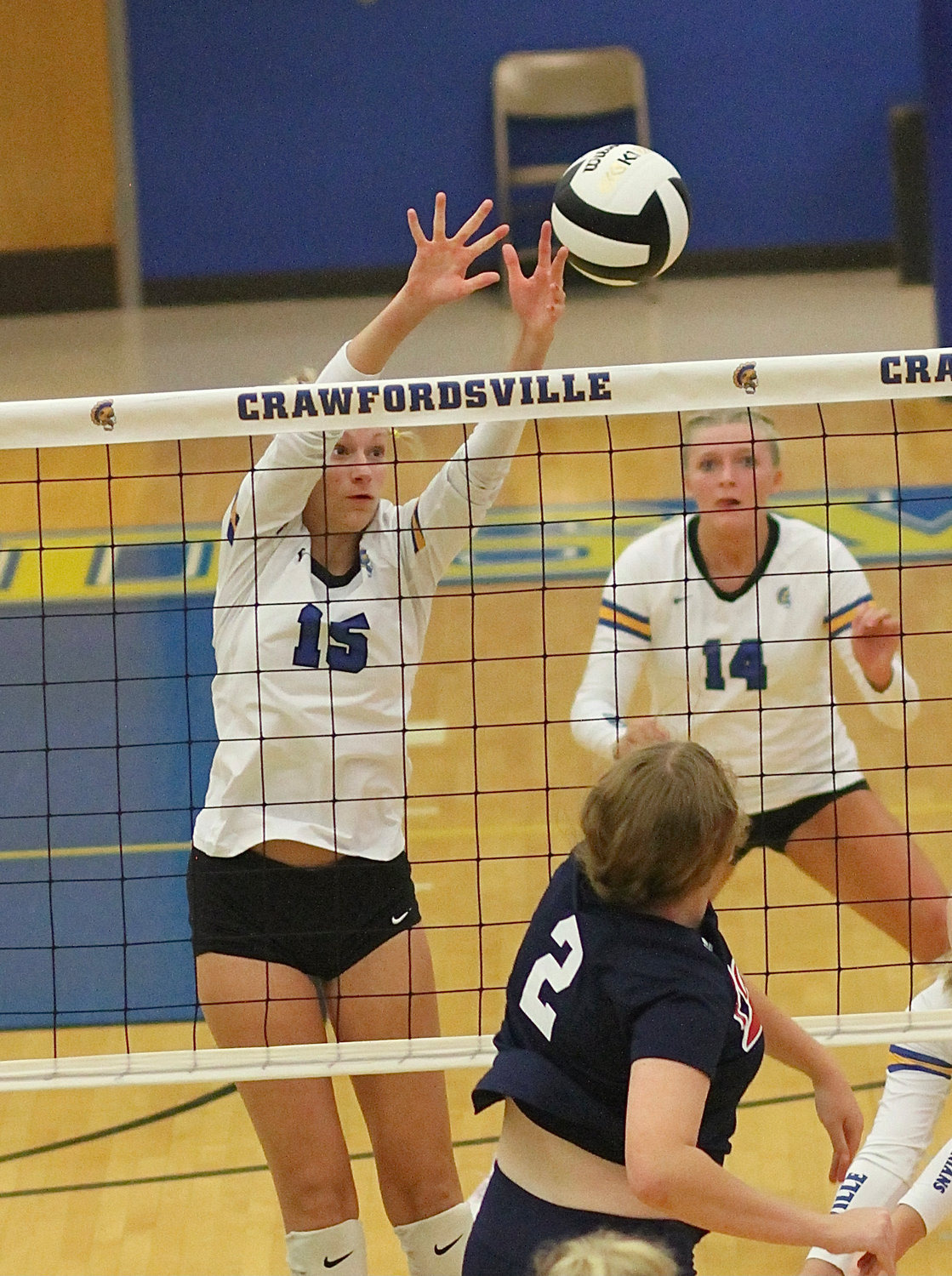 Hallie Gayler goes up for one of her four blocks on the night.